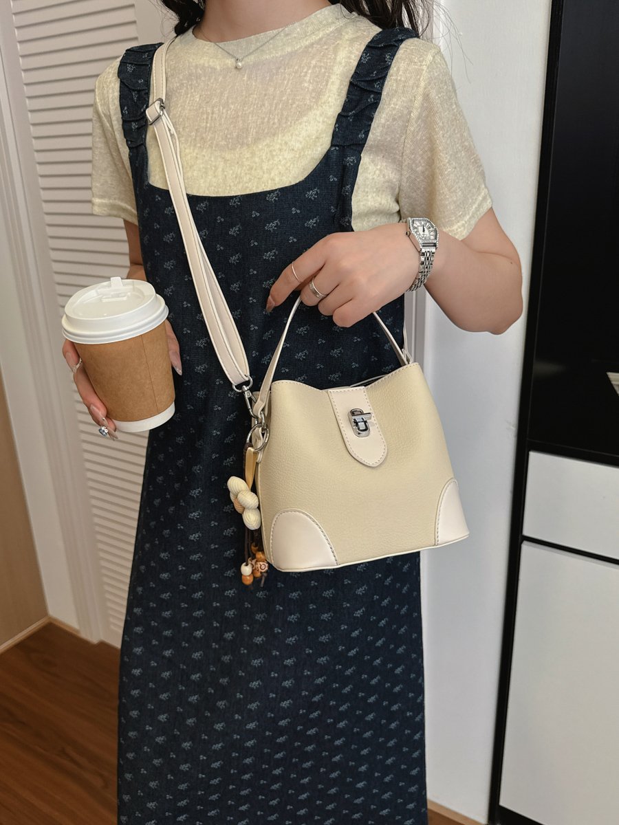 Solid Handbag with Plush Charm