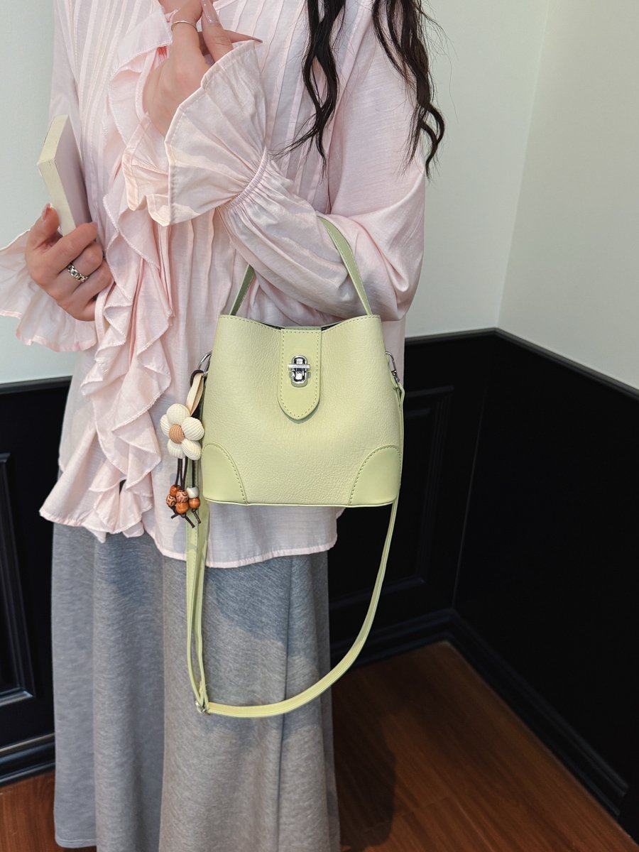 Solid Handbag with Plush Charm