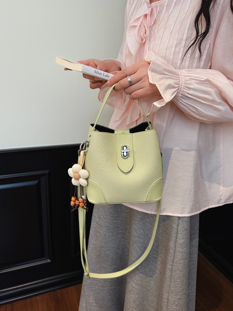 Solid Handbag with Plush Charm