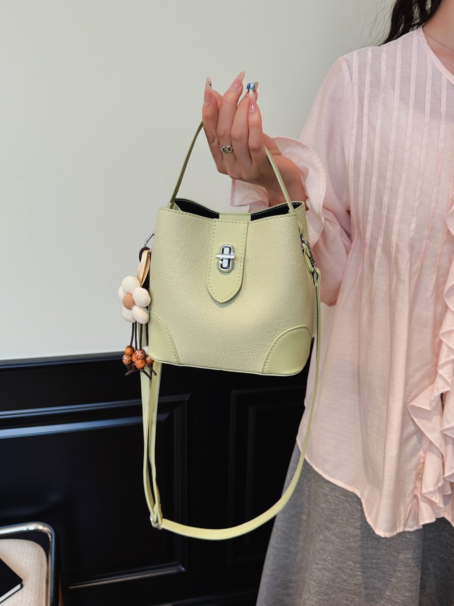 Solid Handbag with Plush Charm