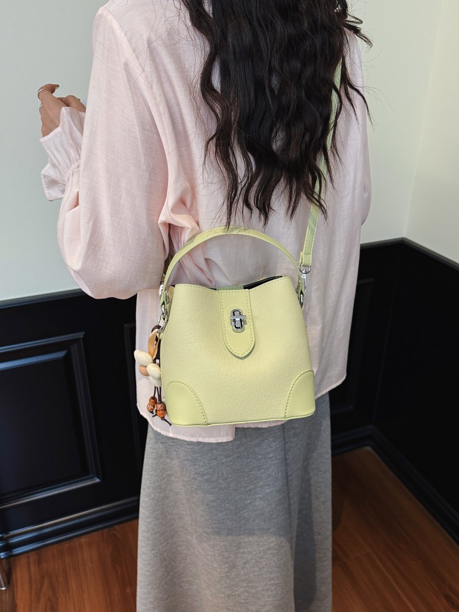 Solid Handbag with Plush Charm