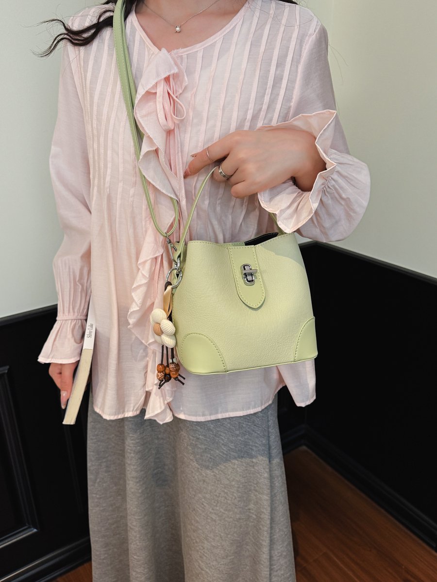Solid Handbag with Plush Charm