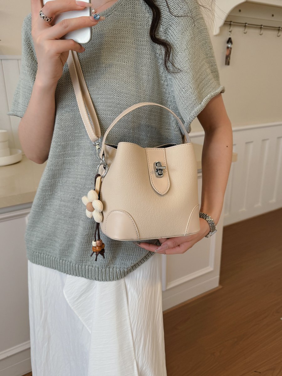 Solid Handbag with Plush Charm
