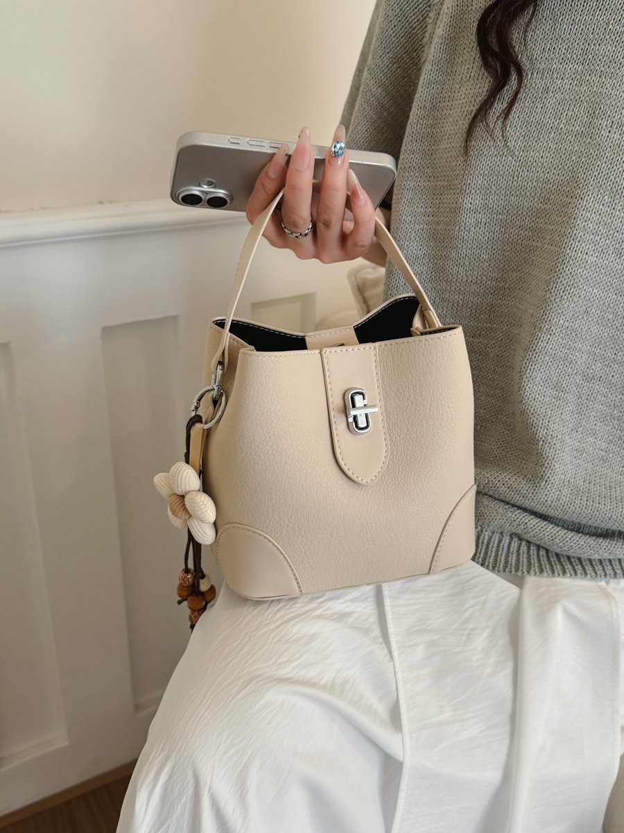 Solid Handbag with Plush Charm