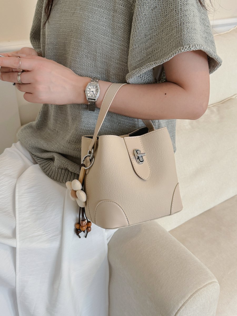 Solid Handbag with Plush Charm