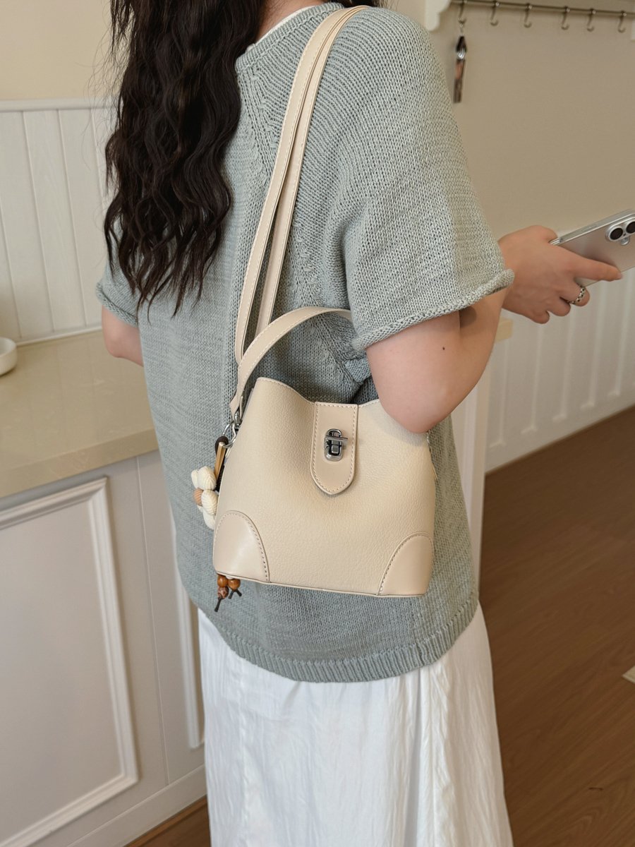 Solid Handbag with Plush Charm