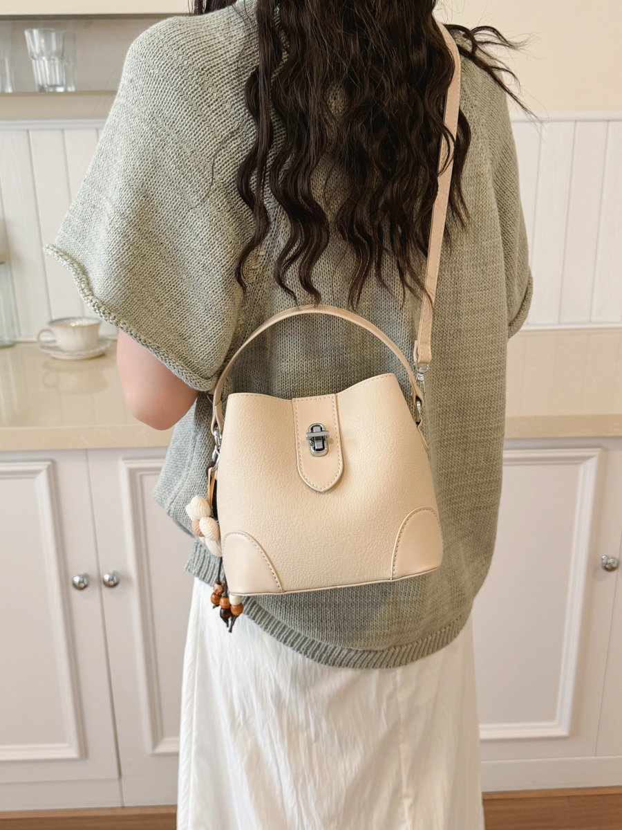 Solid Handbag with Plush Charm