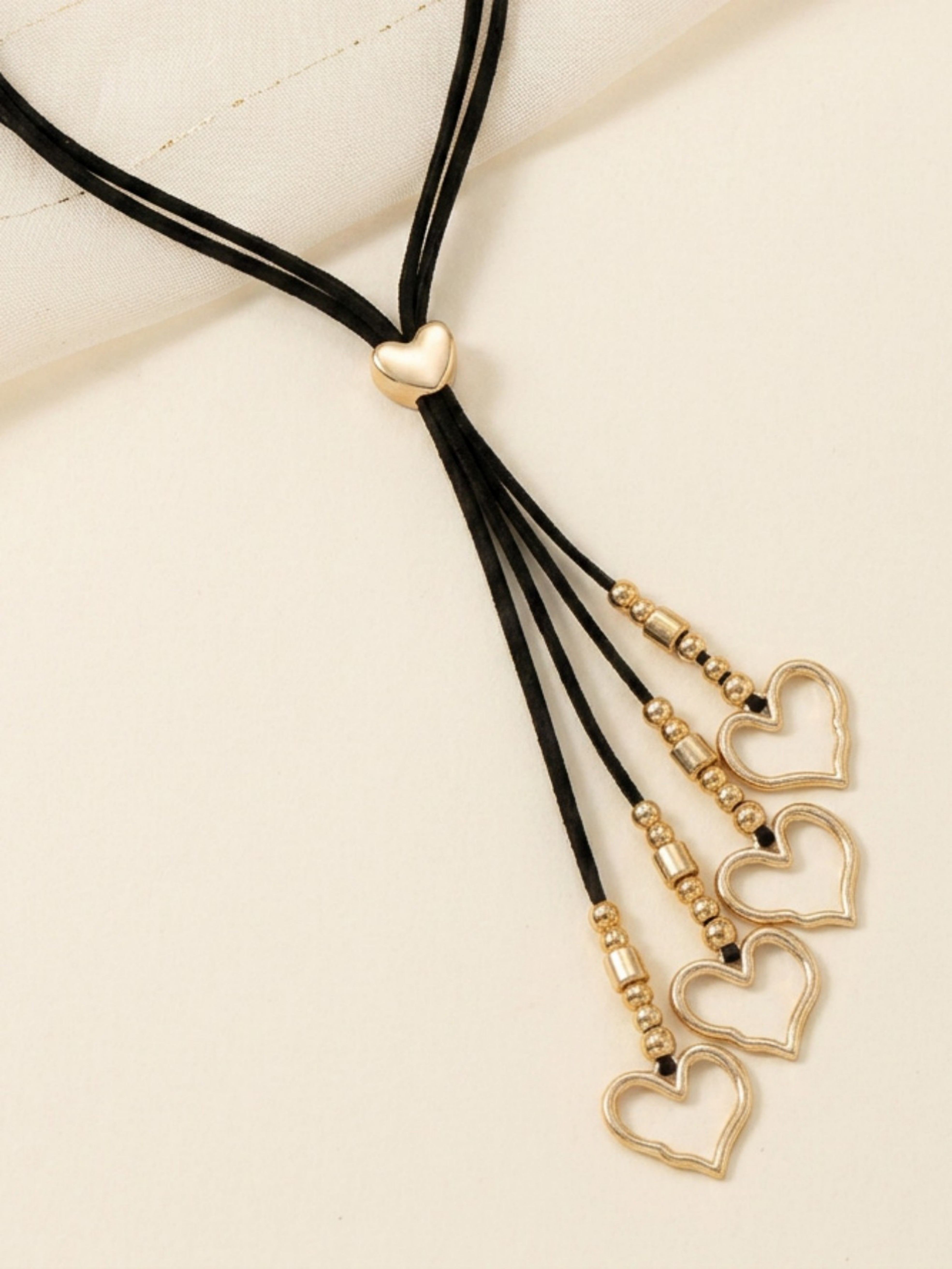 Black Cord Lariat Necklace with Golden Heart Pendants