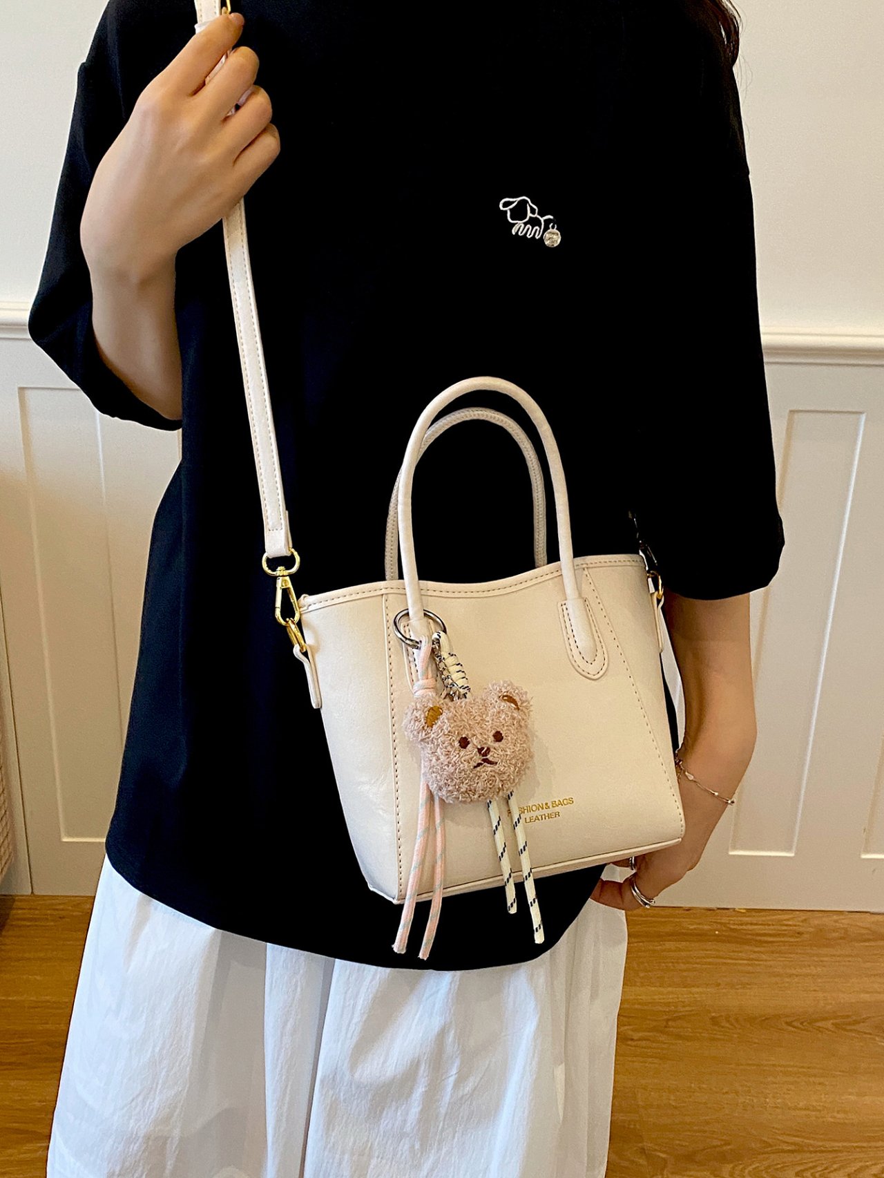 Solid Handbag with Plush Charm