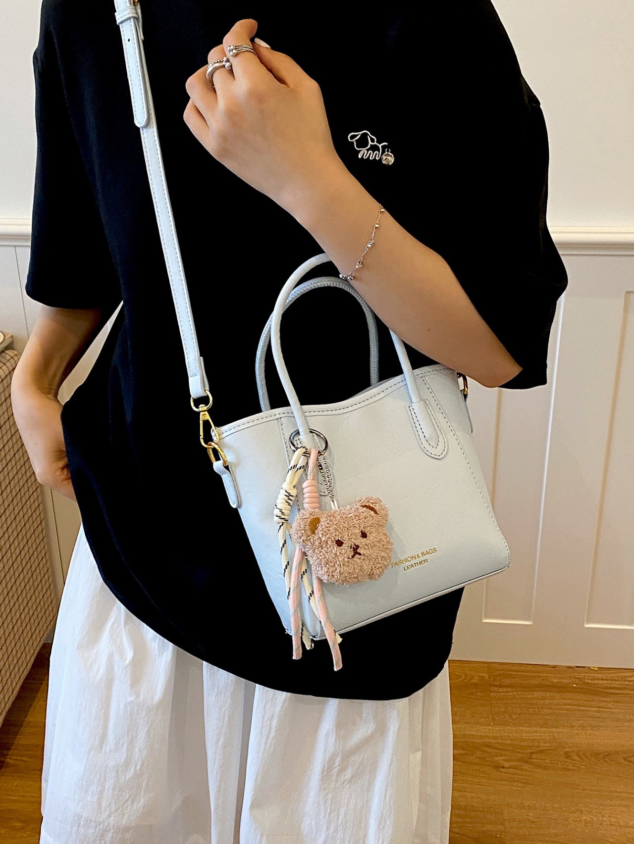 Solid Handbag with Plush Charm