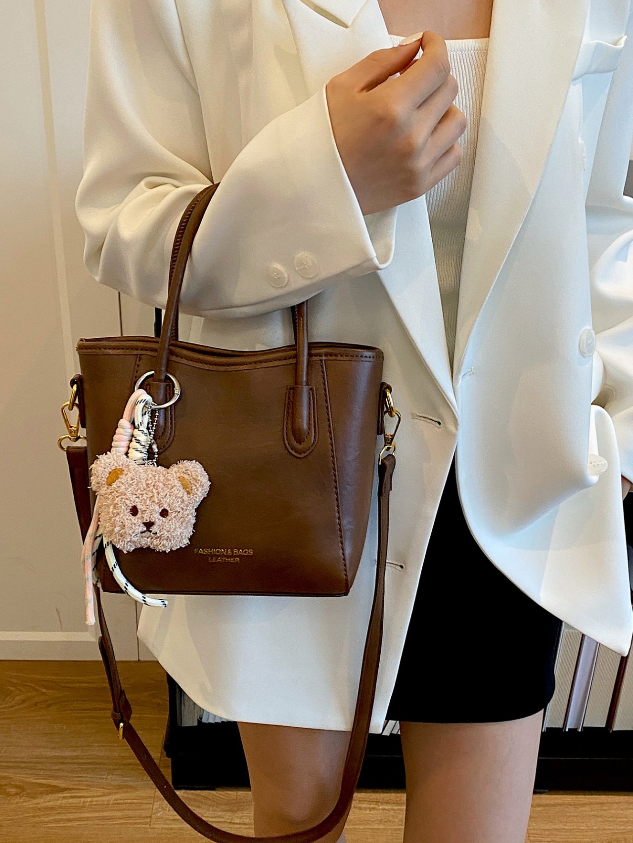 Solid Handbag with Plush Charm