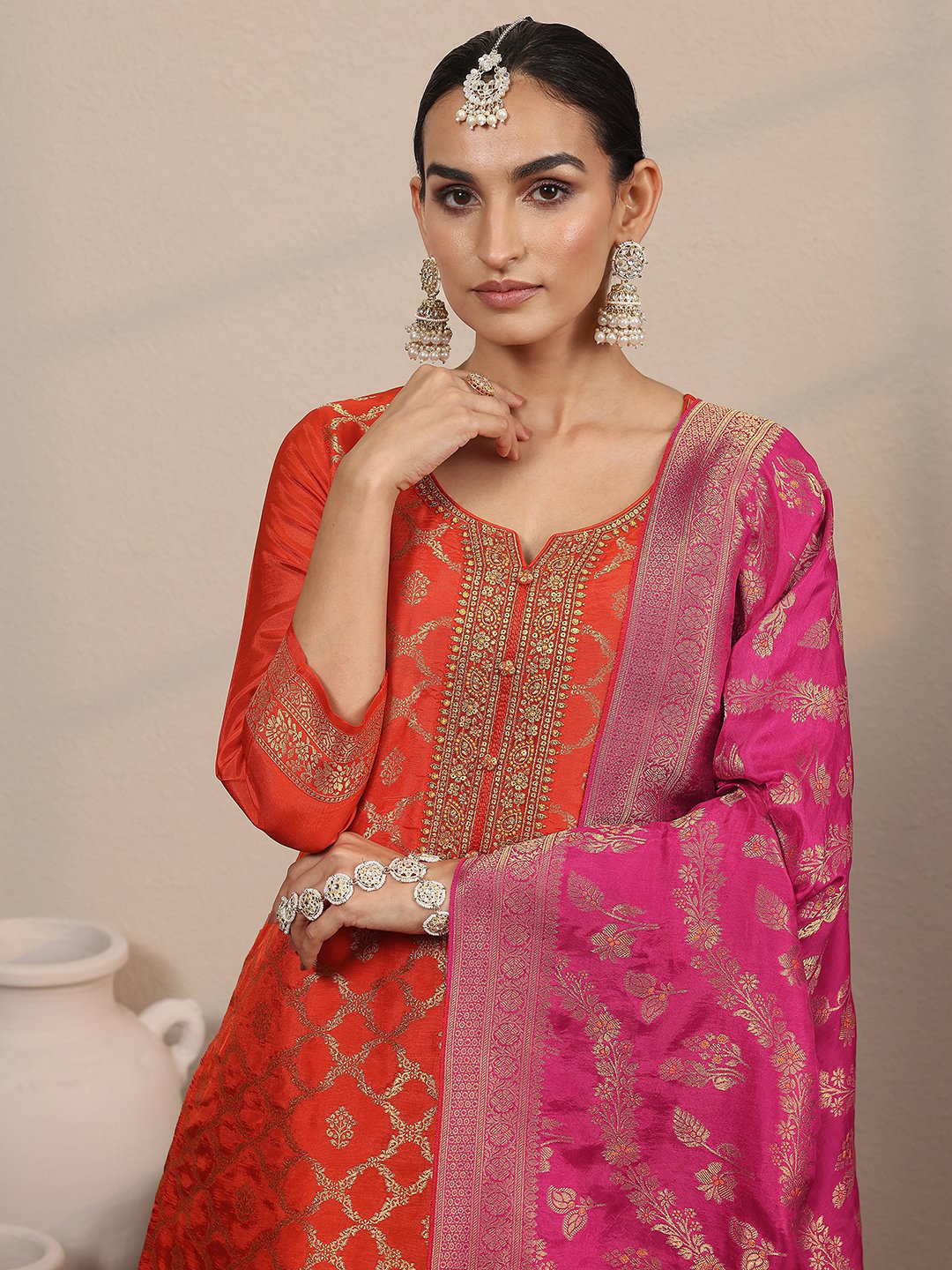 Orange Self Design Silk Blend Straight Kurta, Trousers and Dupatta Set