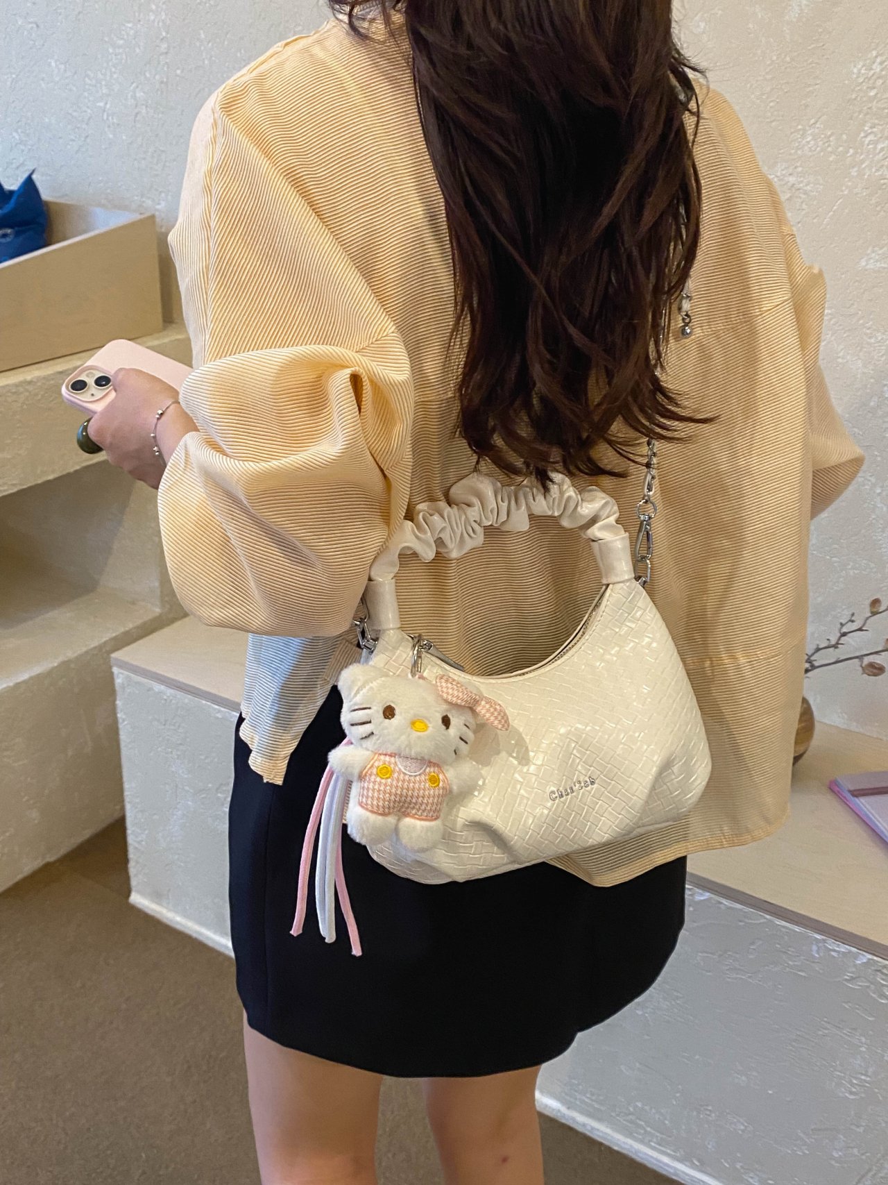 Textured Handbag with Plush Charm