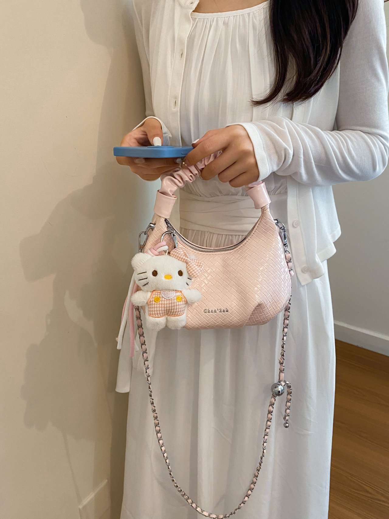 Textured Handbag with Plush Charm