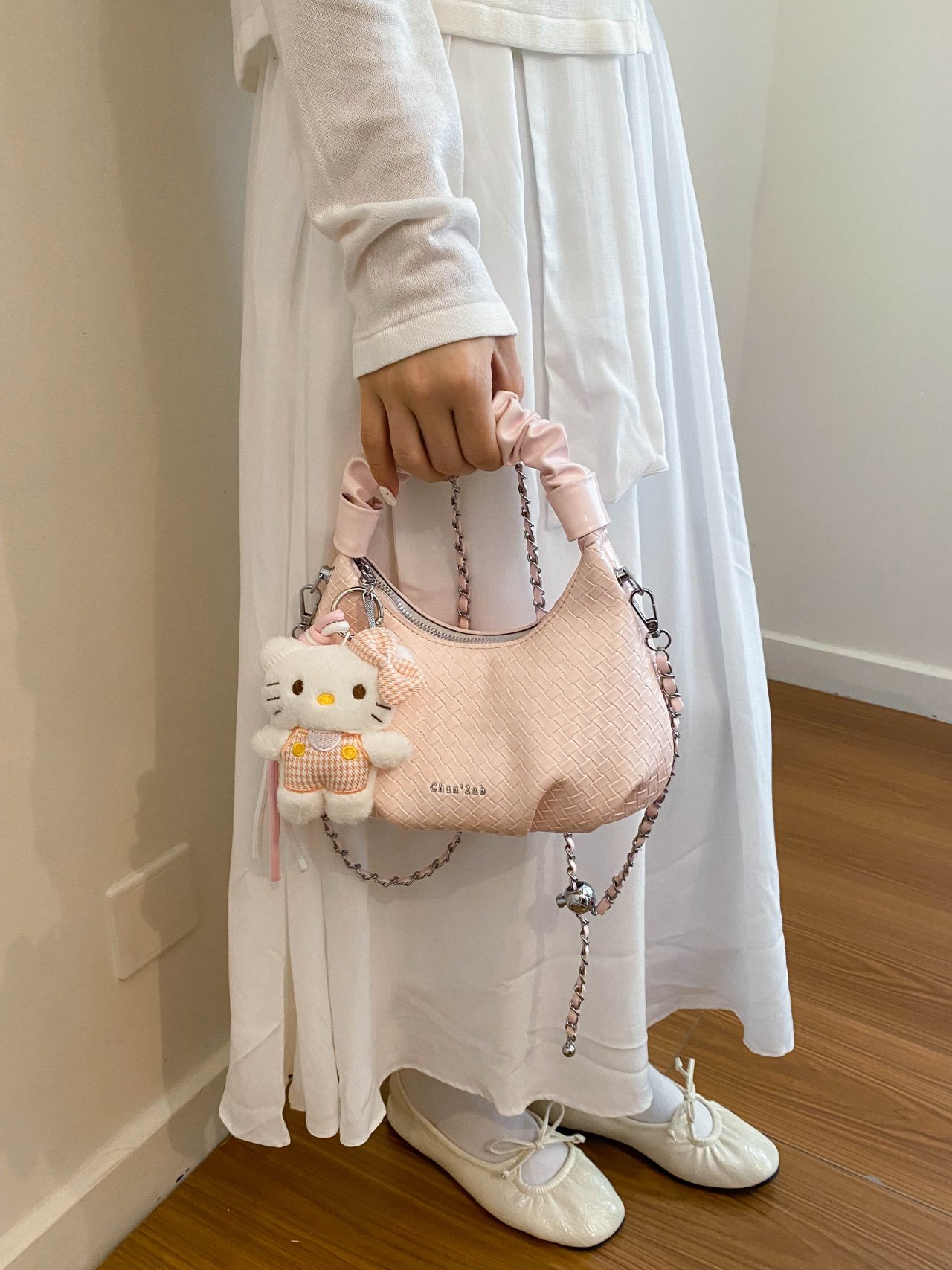Textured Handbag with Plush Charm