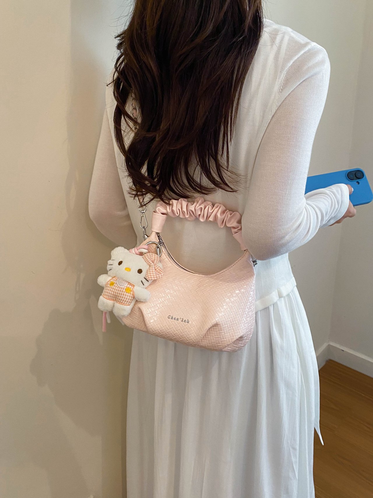 Textured Handbag with Plush Charm