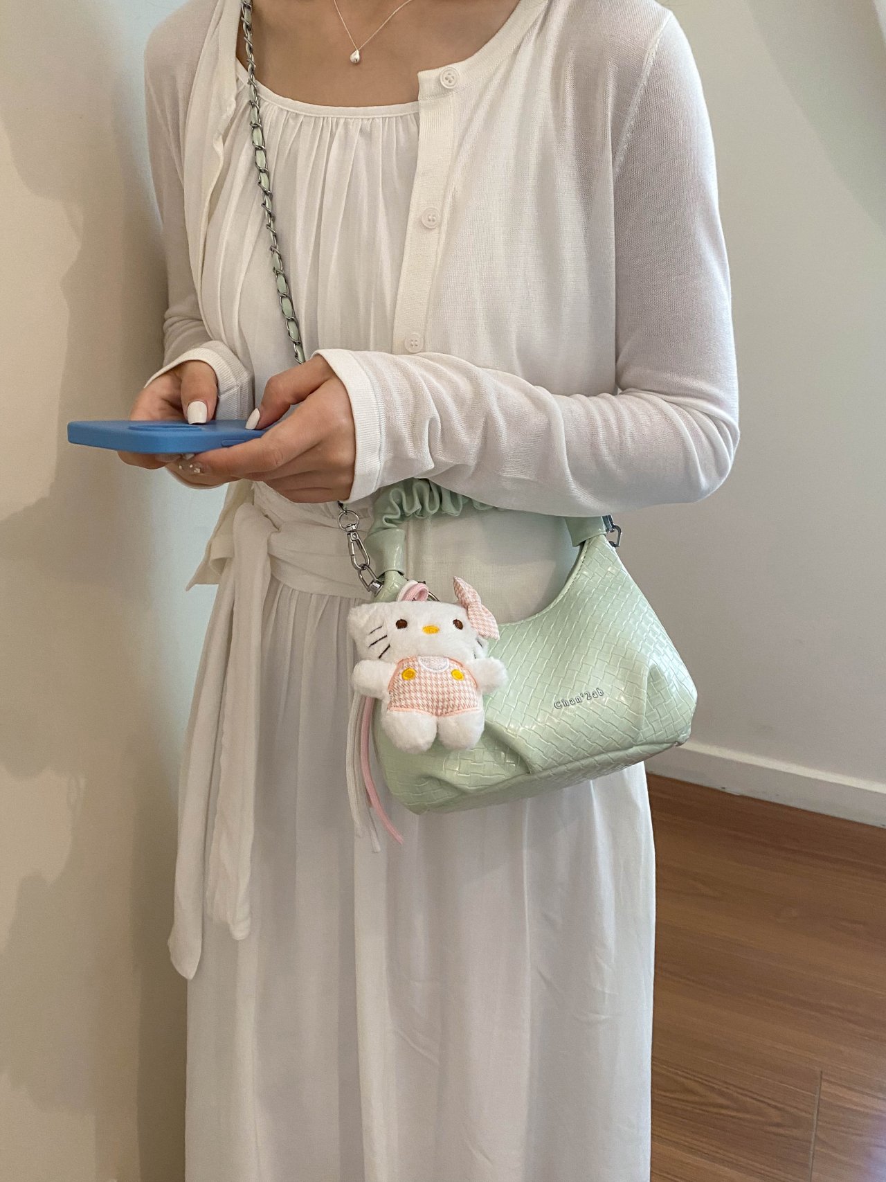 Textured Handbag with Plush Charm