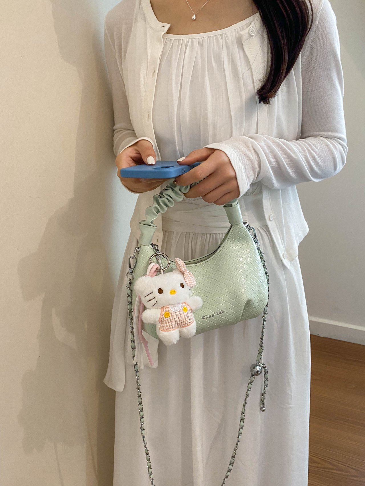 Textured Handbag with Plush Charm
