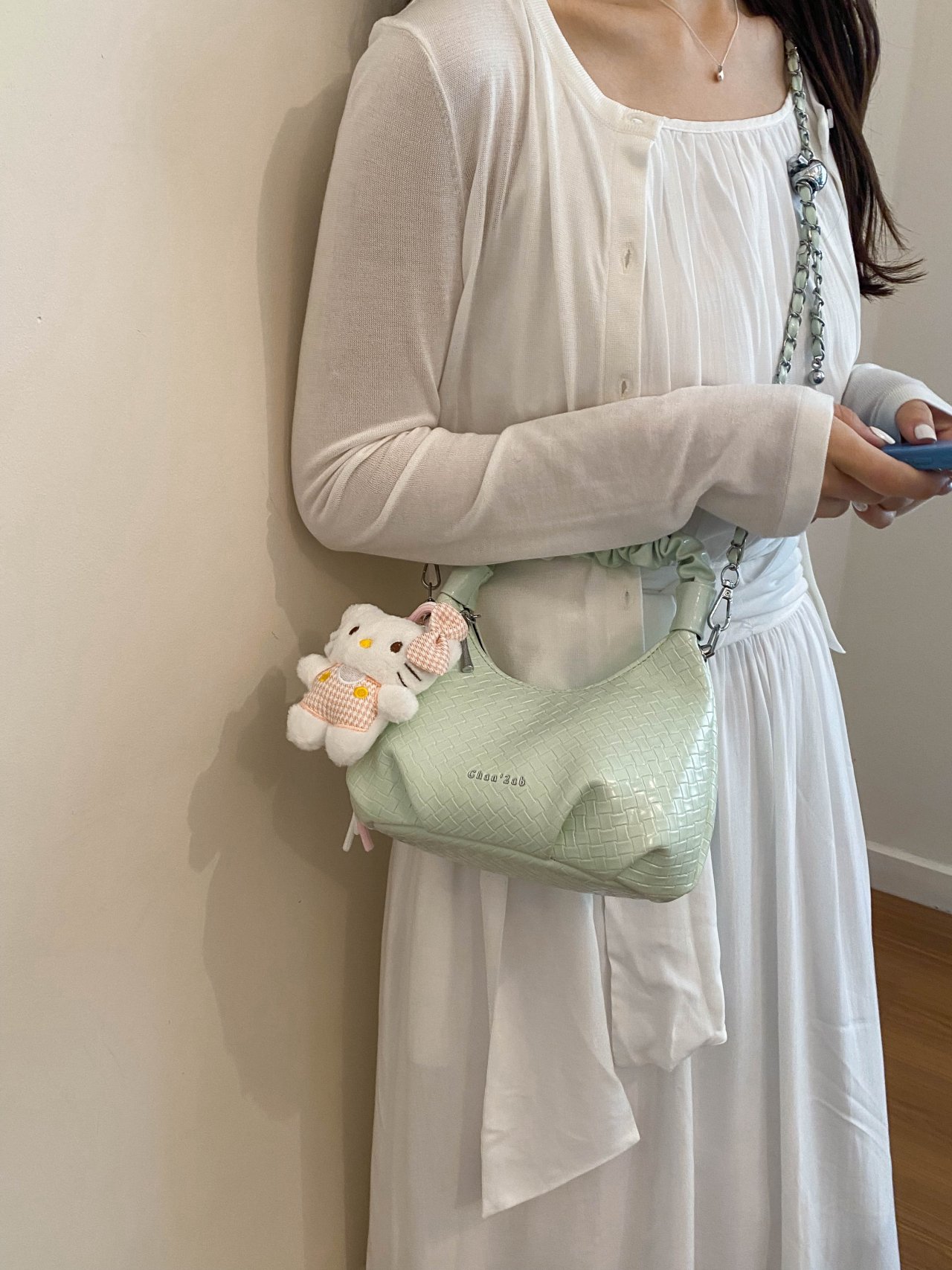 Textured Handbag with Plush Charm