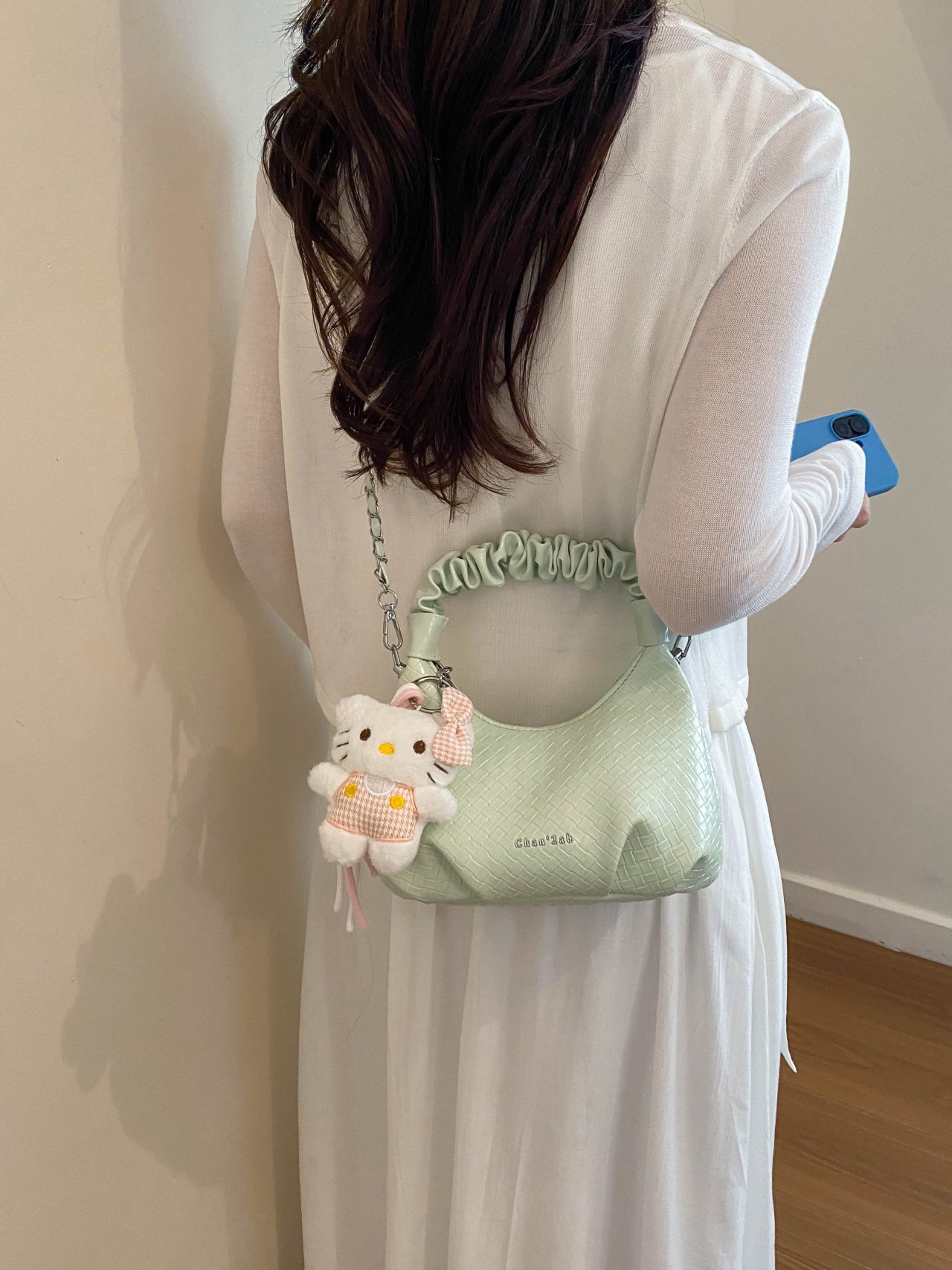 Textured Handbag with Plush Charm