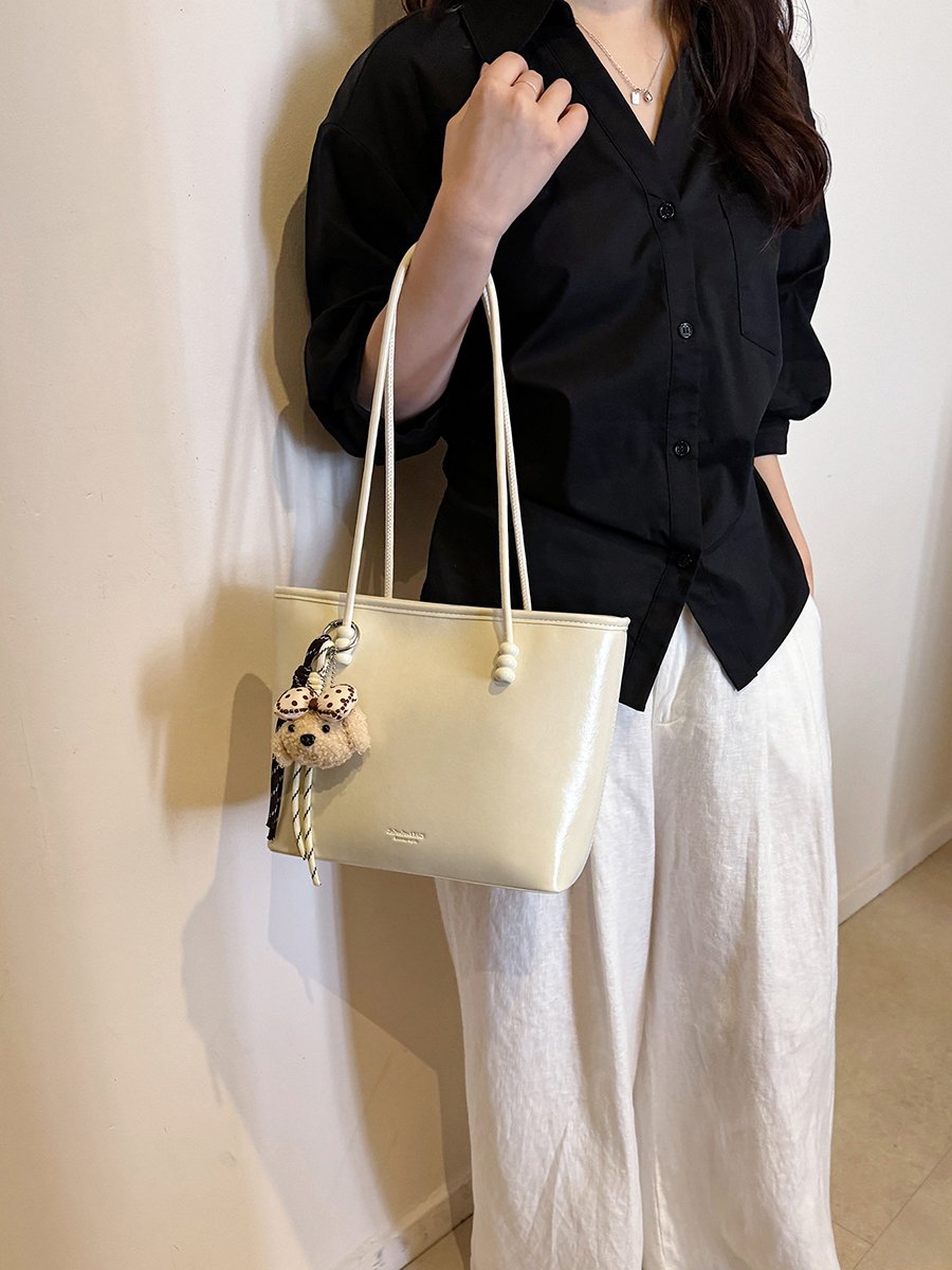 Solid Shoulder Bag with Plush Charm