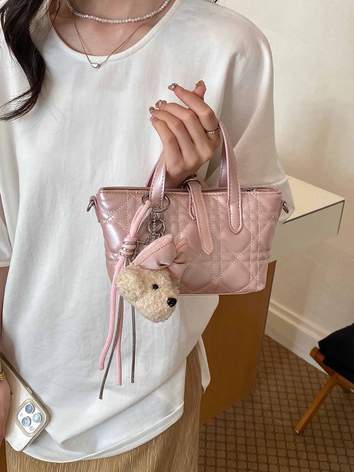 Quilted Handbag with Plush Charm