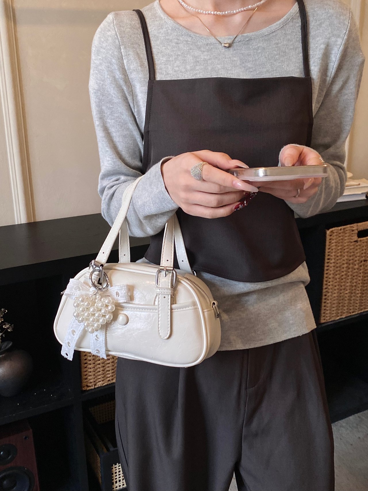 Solid Handbag with Buckle Strap and Charm