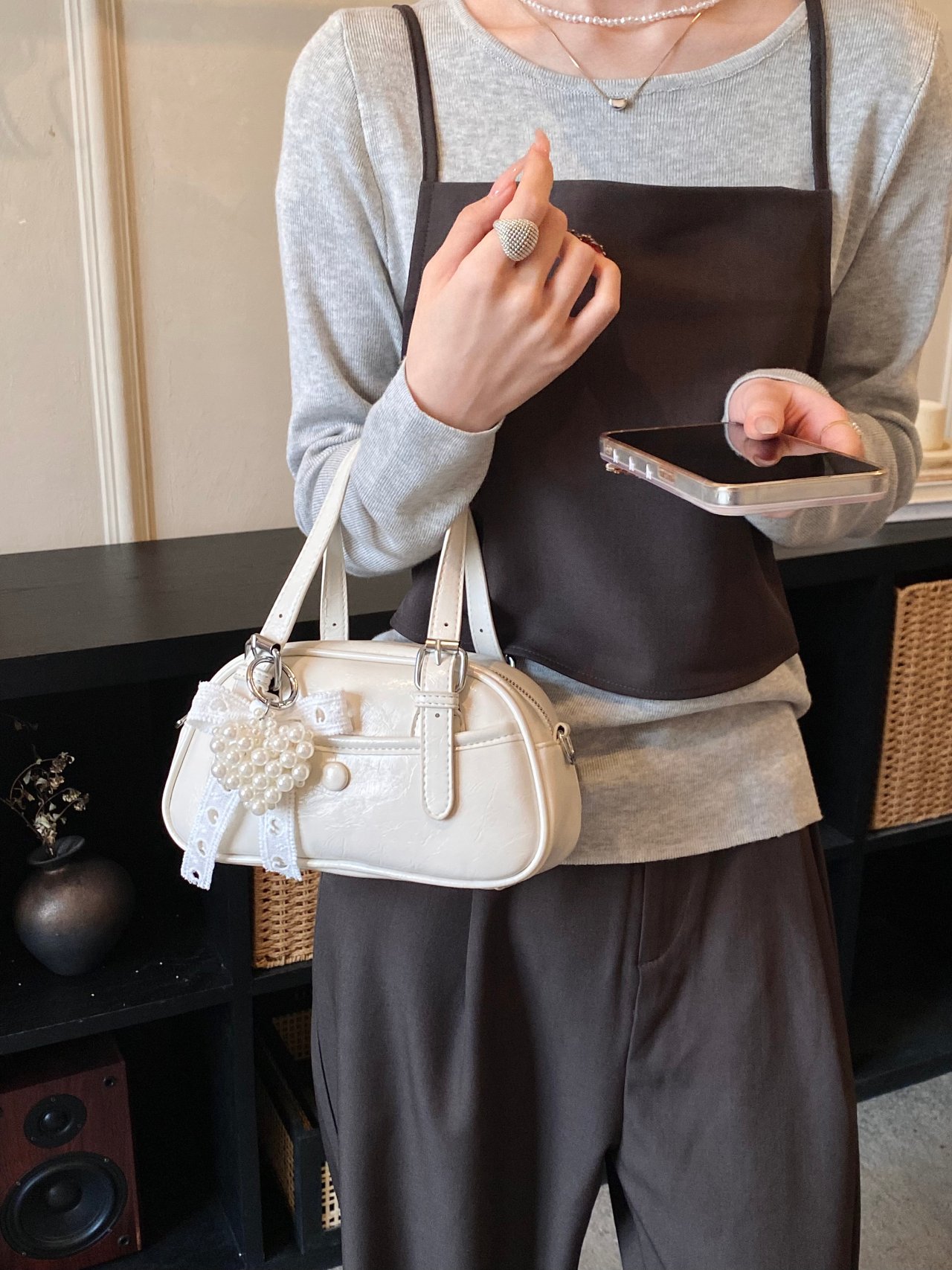 Solid Handbag with Buckle Strap and Charm