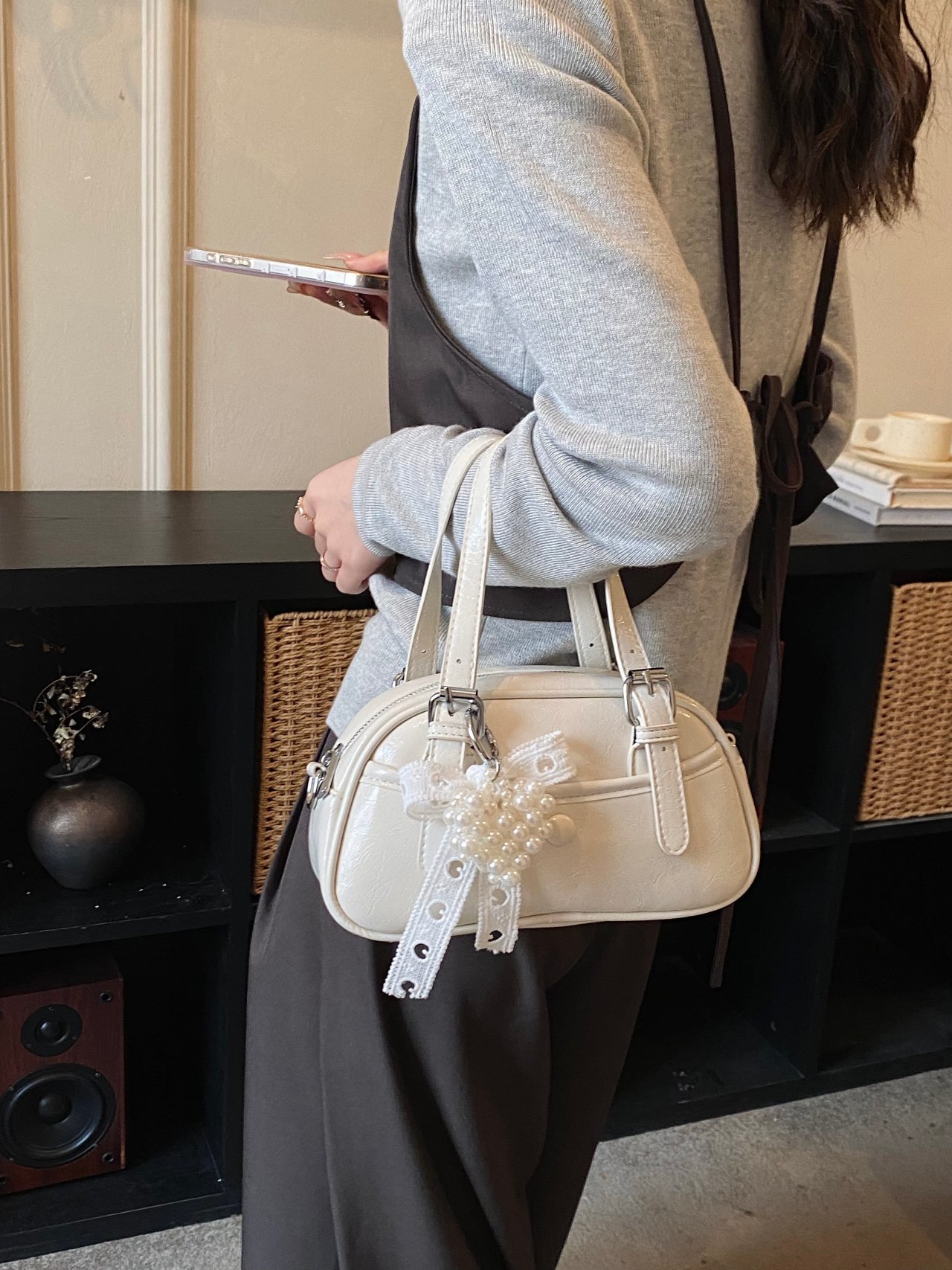 Solid Handbag with Buckle Strap and Charm