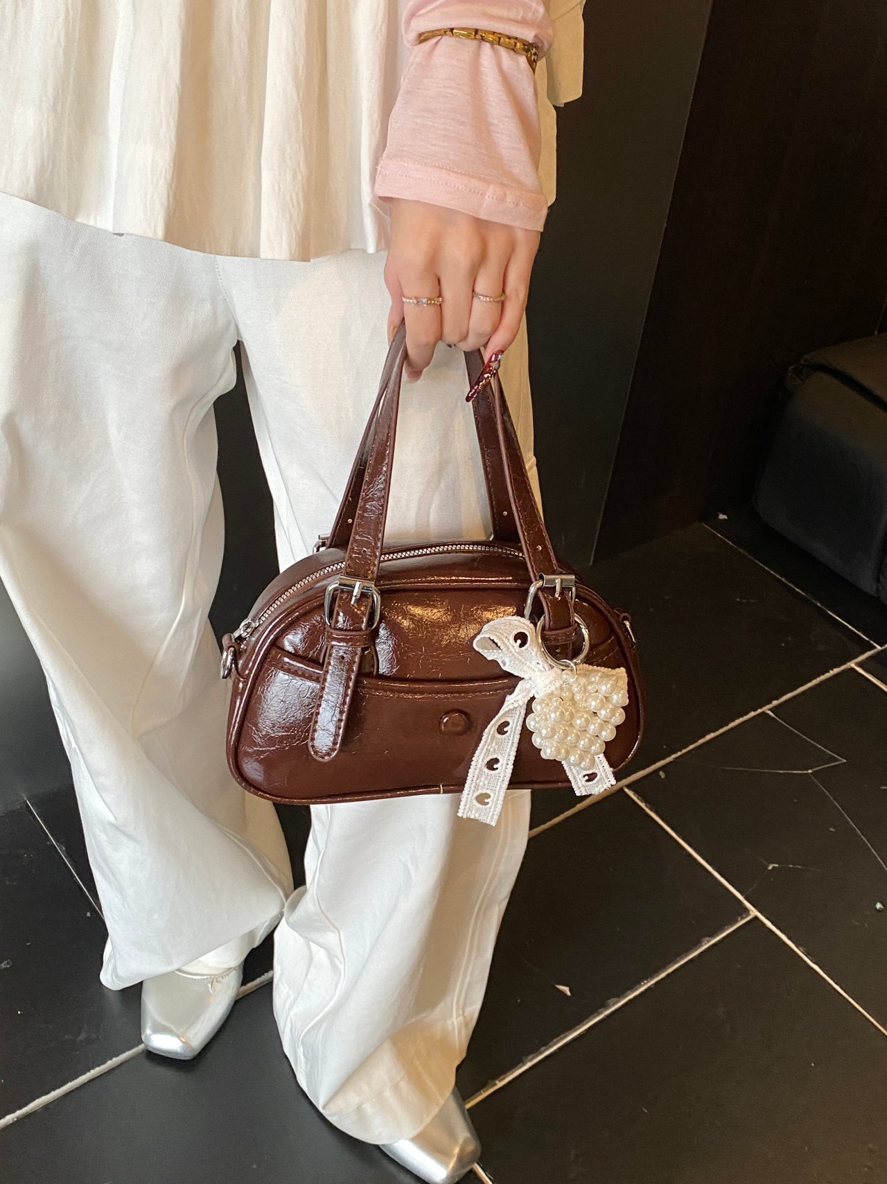 Solid Handbag with Buckle Strap and Charm