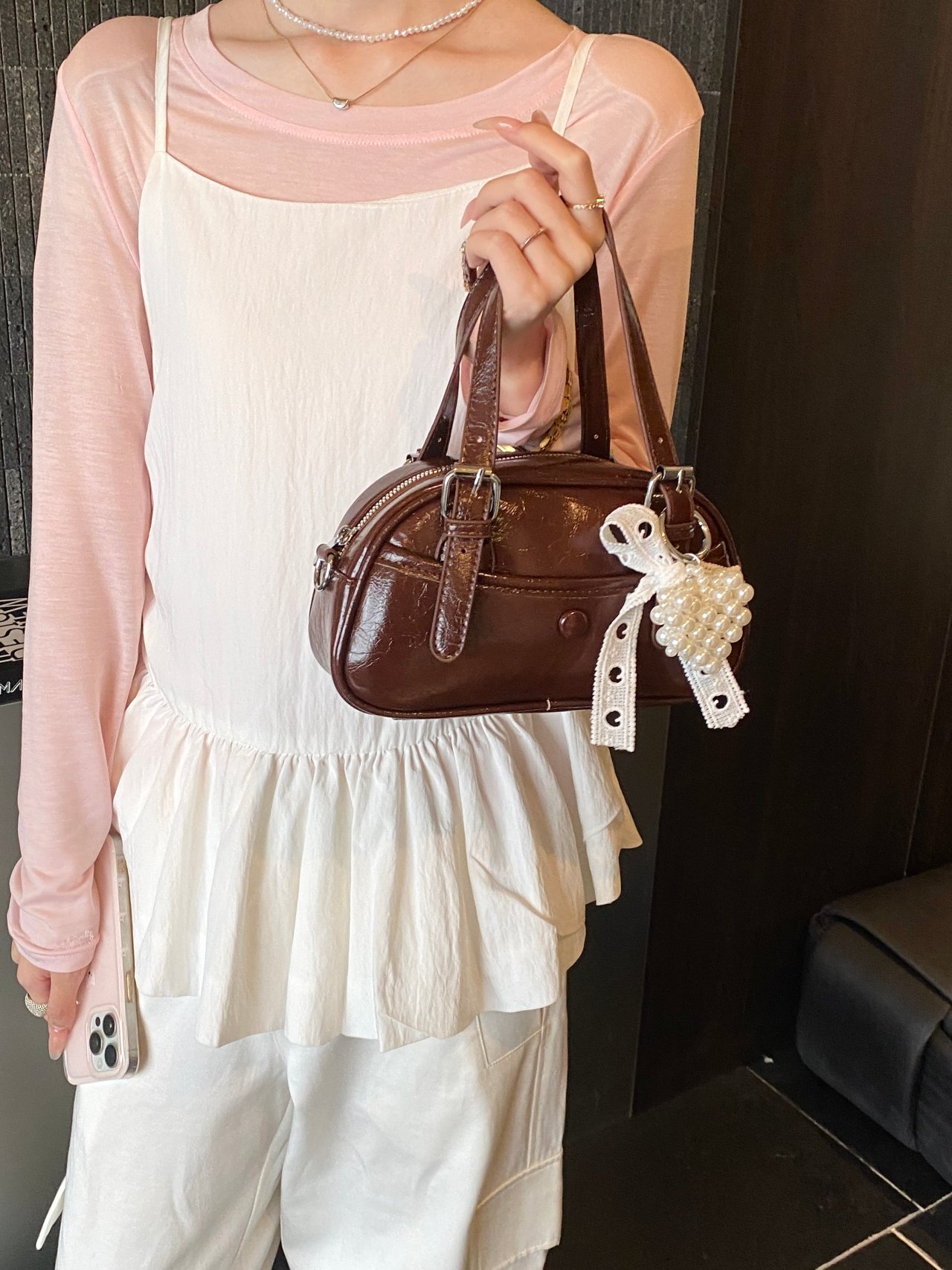 Solid Handbag with Buckle Strap and Charm