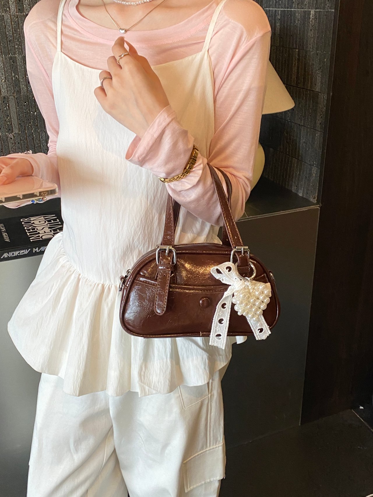 Solid Handbag with Buckle Strap and Charm
