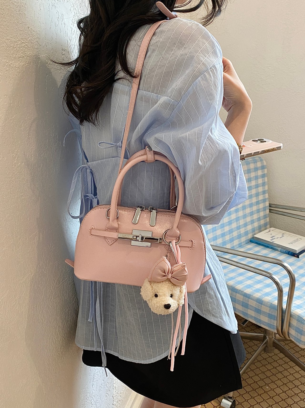 Solid Handbag with Plush Charm and Turn-Lock Detail