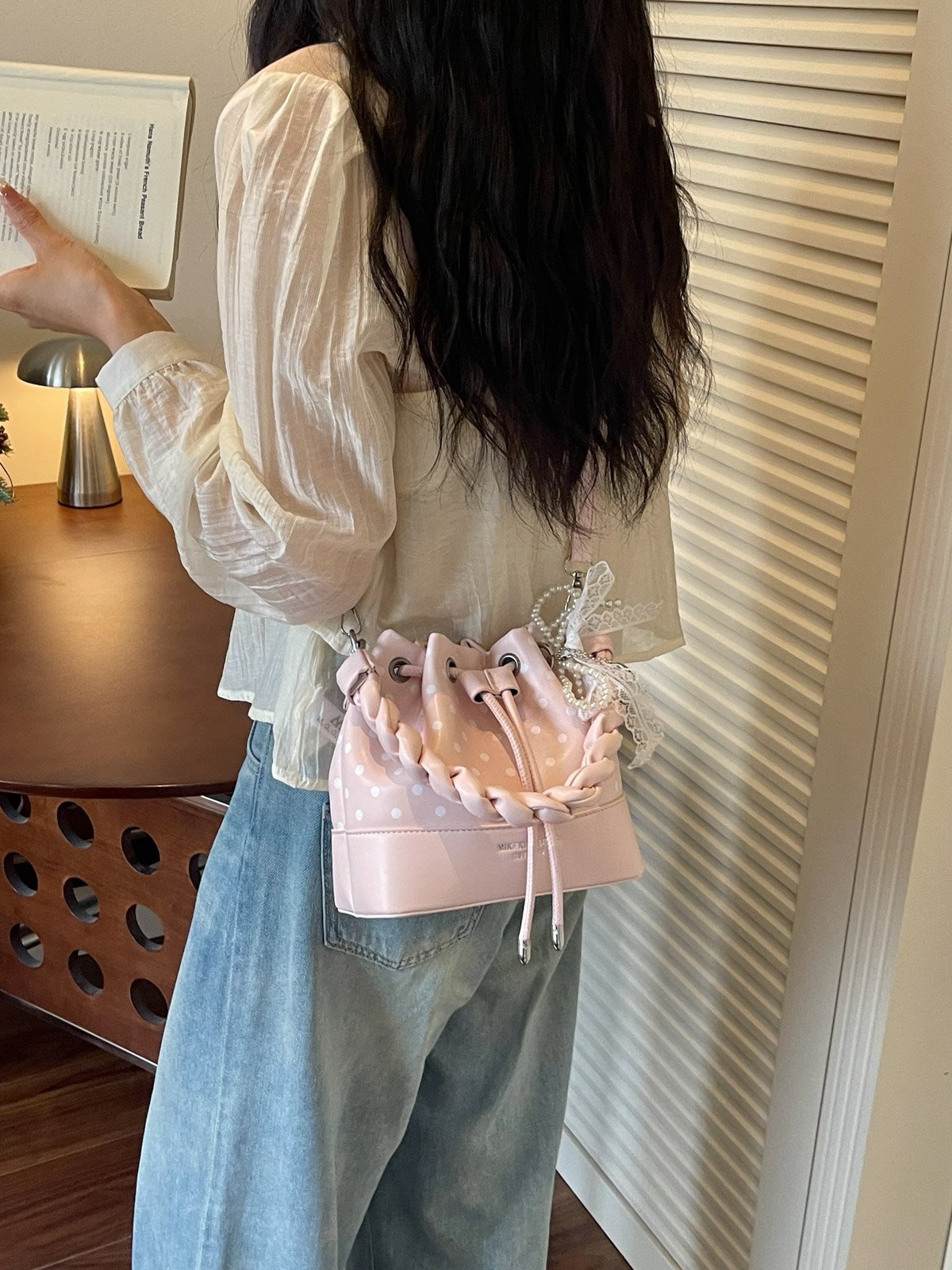 Polka Dot Drawstring Crossbody Bag with Charm