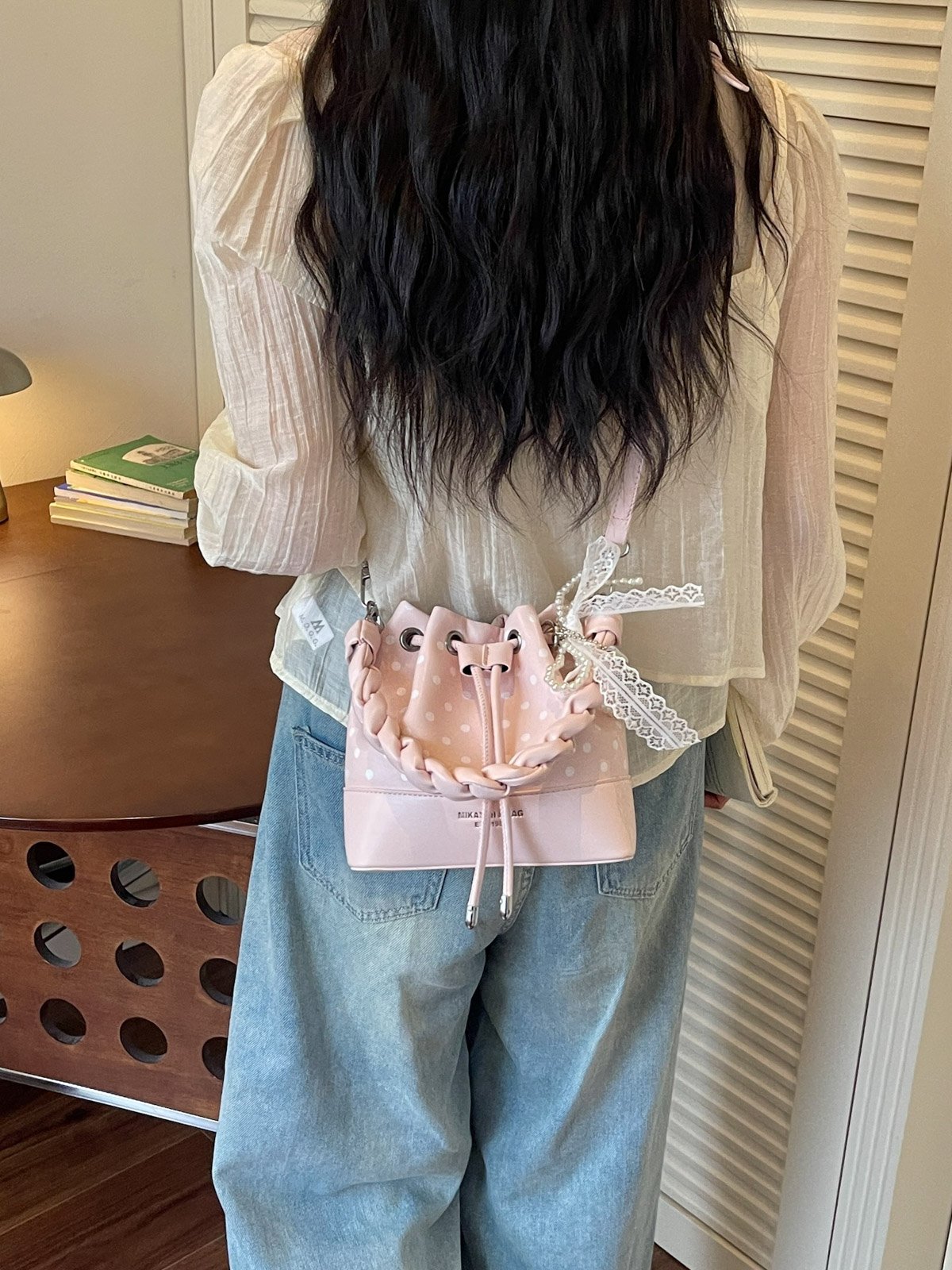 Polka Dot Drawstring Crossbody Bag with Charm
