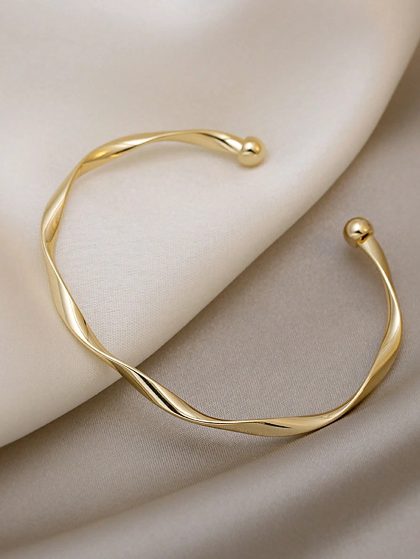 Gold Twisted Cuff Bangle