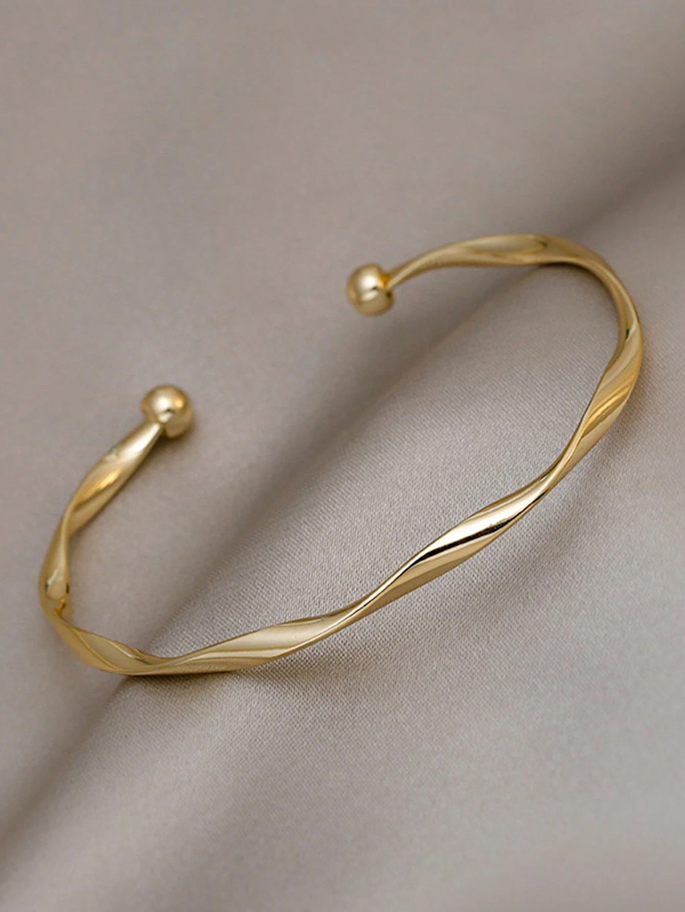 Gold Twisted Cuff Bangle