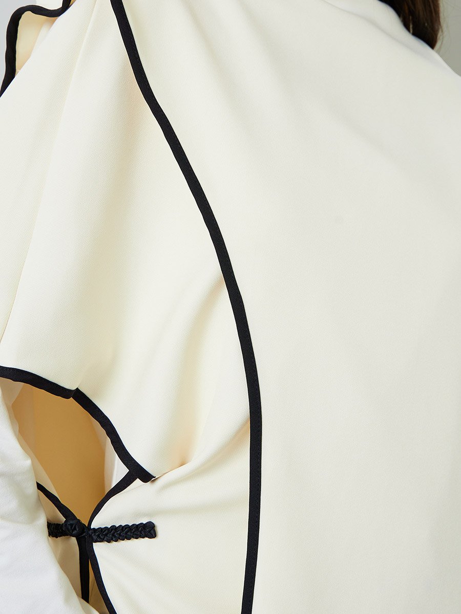 Beige Pullover with Black Trim