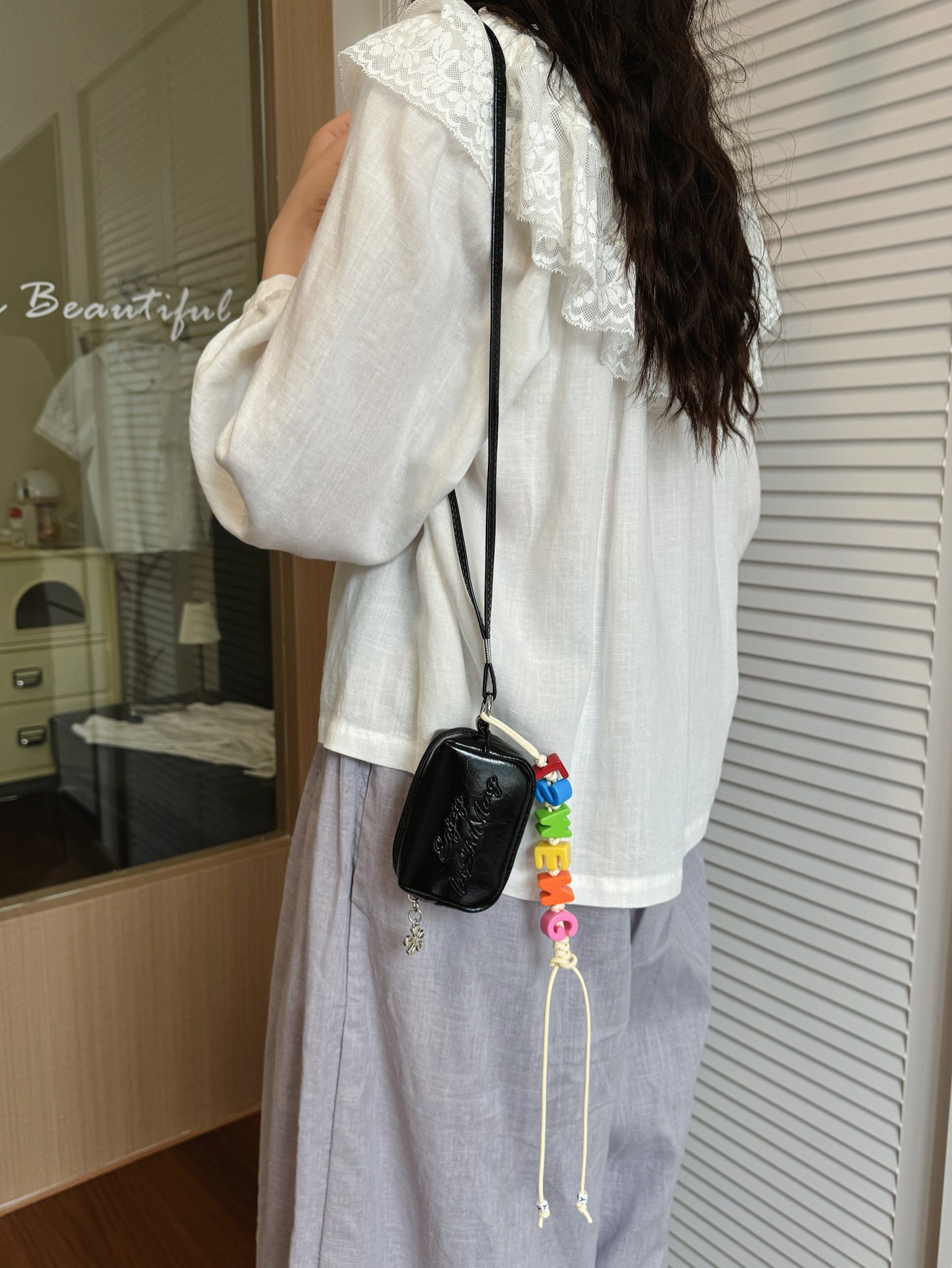 Black Crossbody Bag with Lanyard Charm