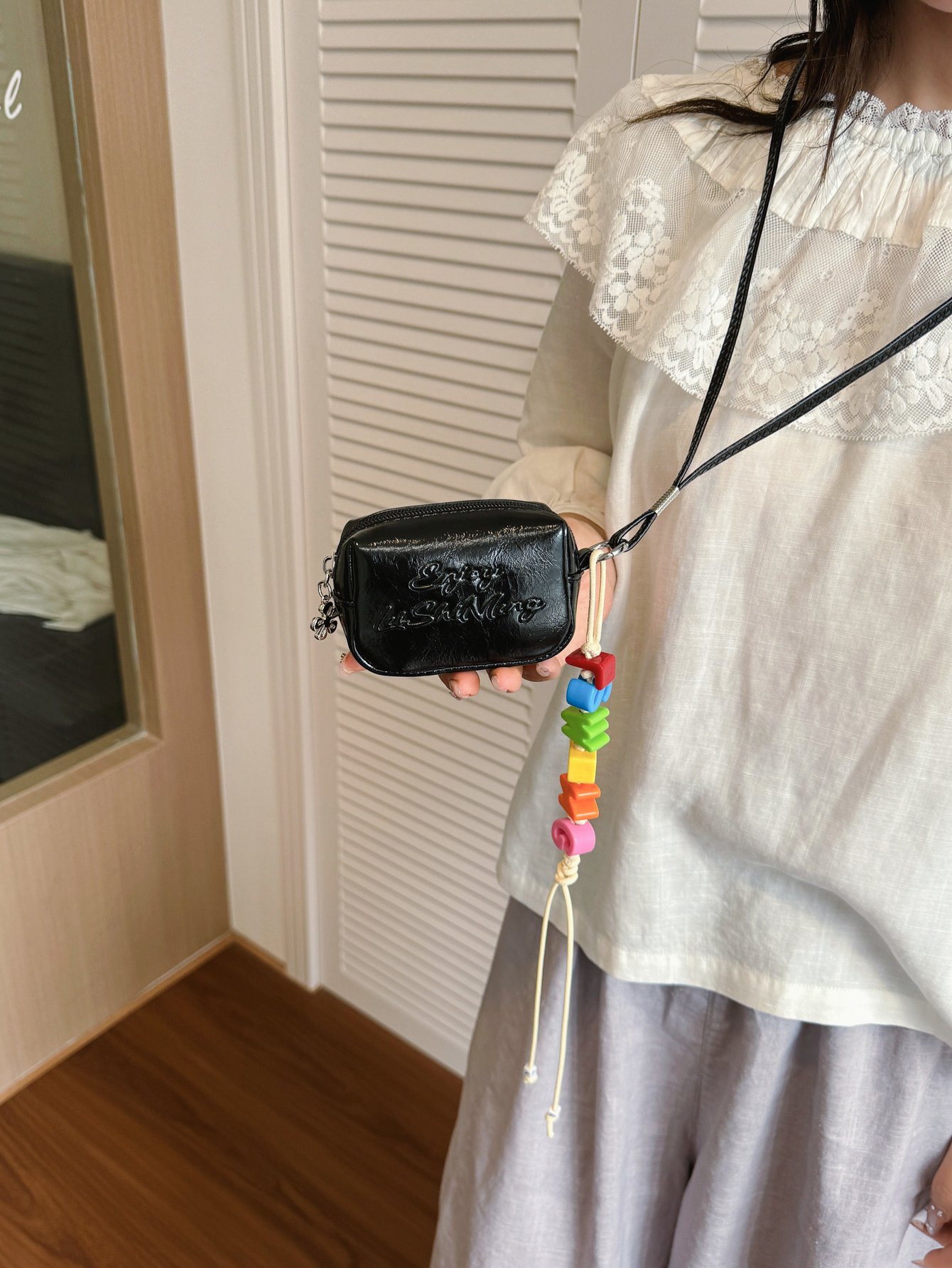 Black Crossbody Bag with Lanyard Charm