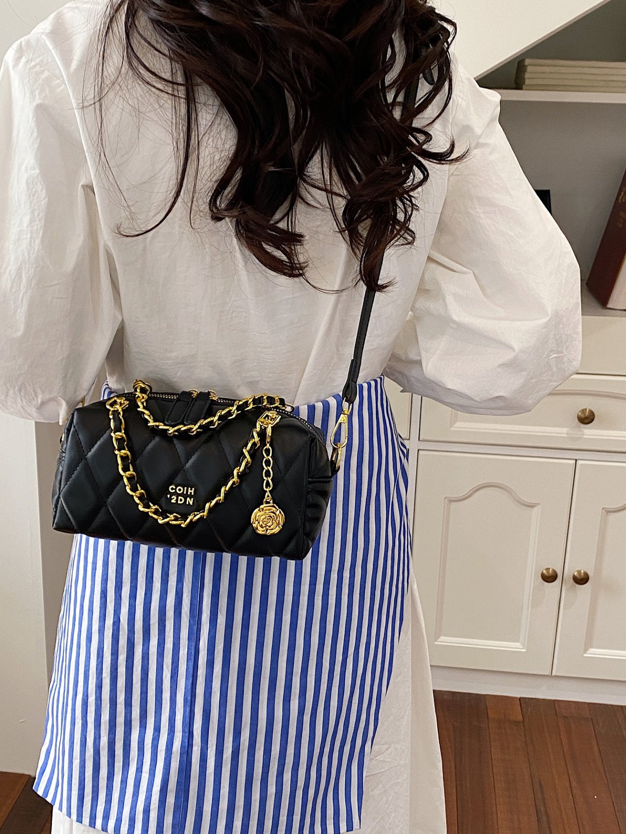 Black Quilted Crossbody Bag with Gold Chain