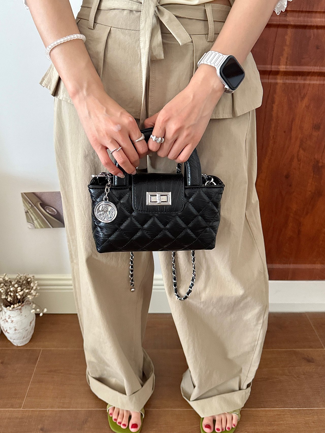 Black Quilted Handbag with Charm