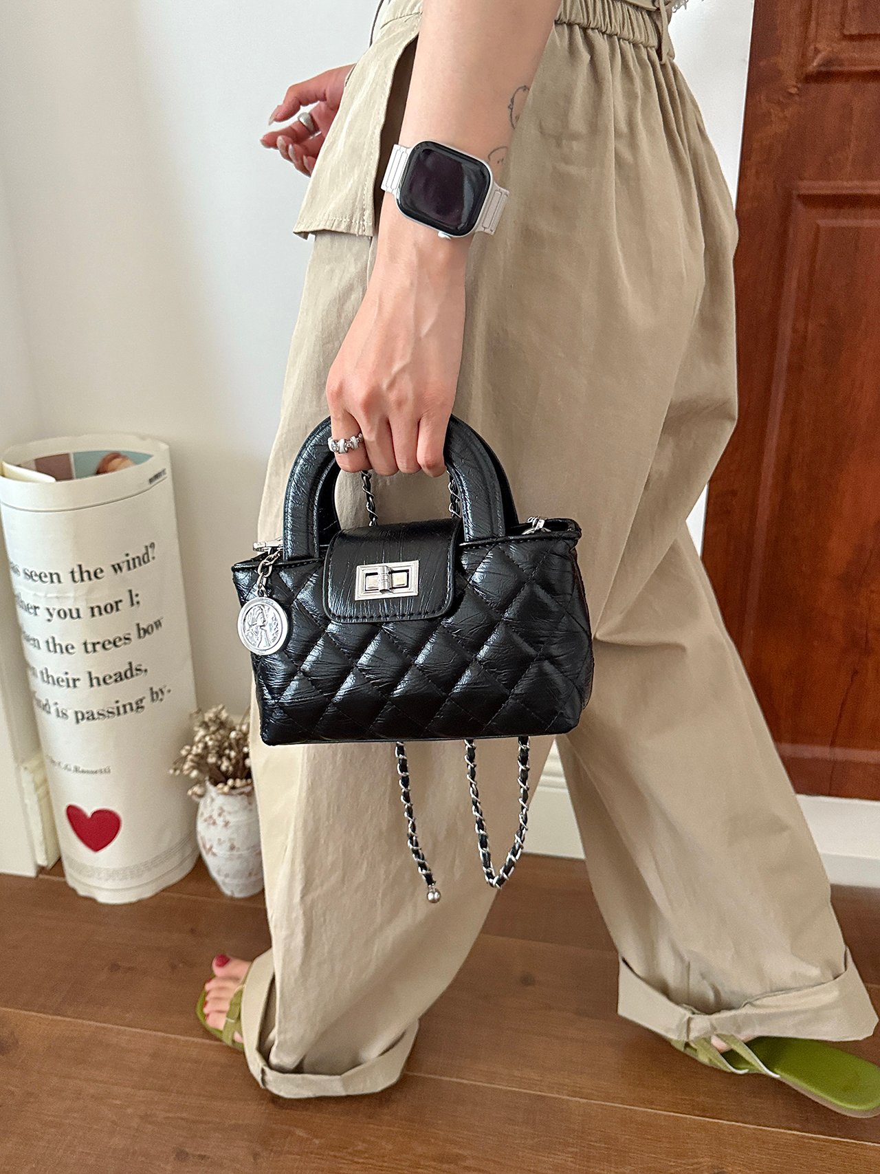 Black Quilted Handbag with Charm