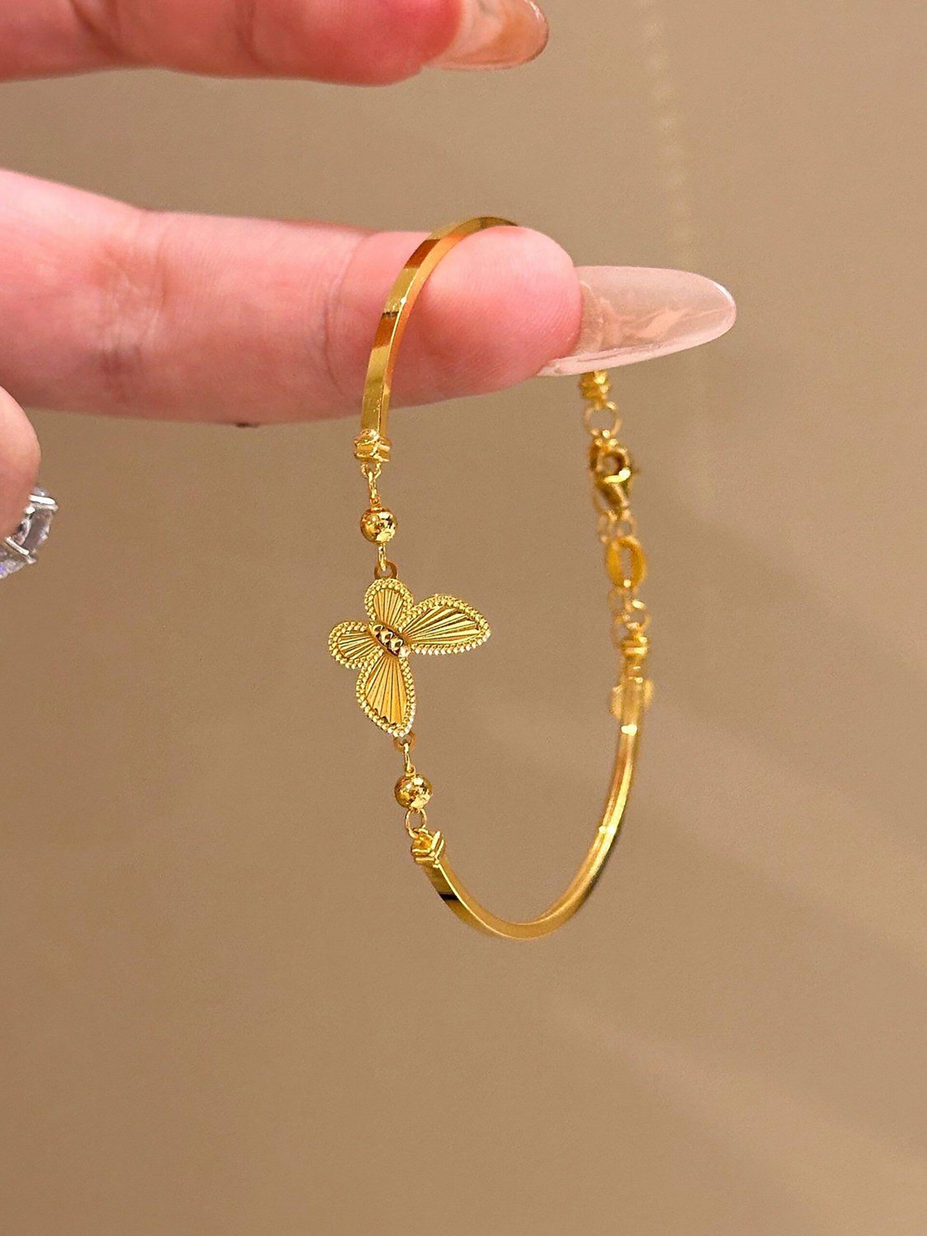 Gold Butterfly Charm Bracelet for Everyday Wear.