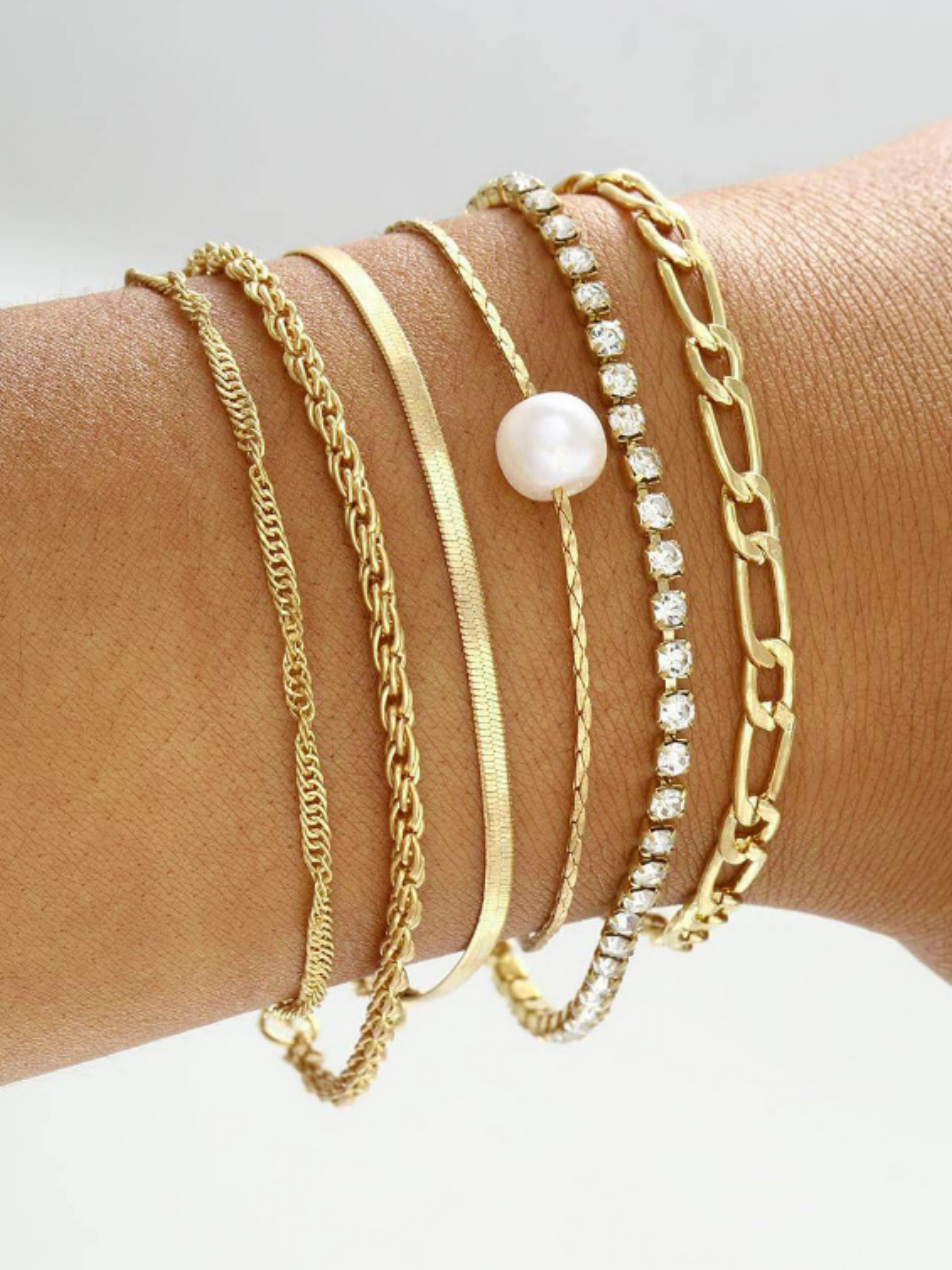 6-Piece Gold Tone Charm Bracelet Stack for Casual Wear.