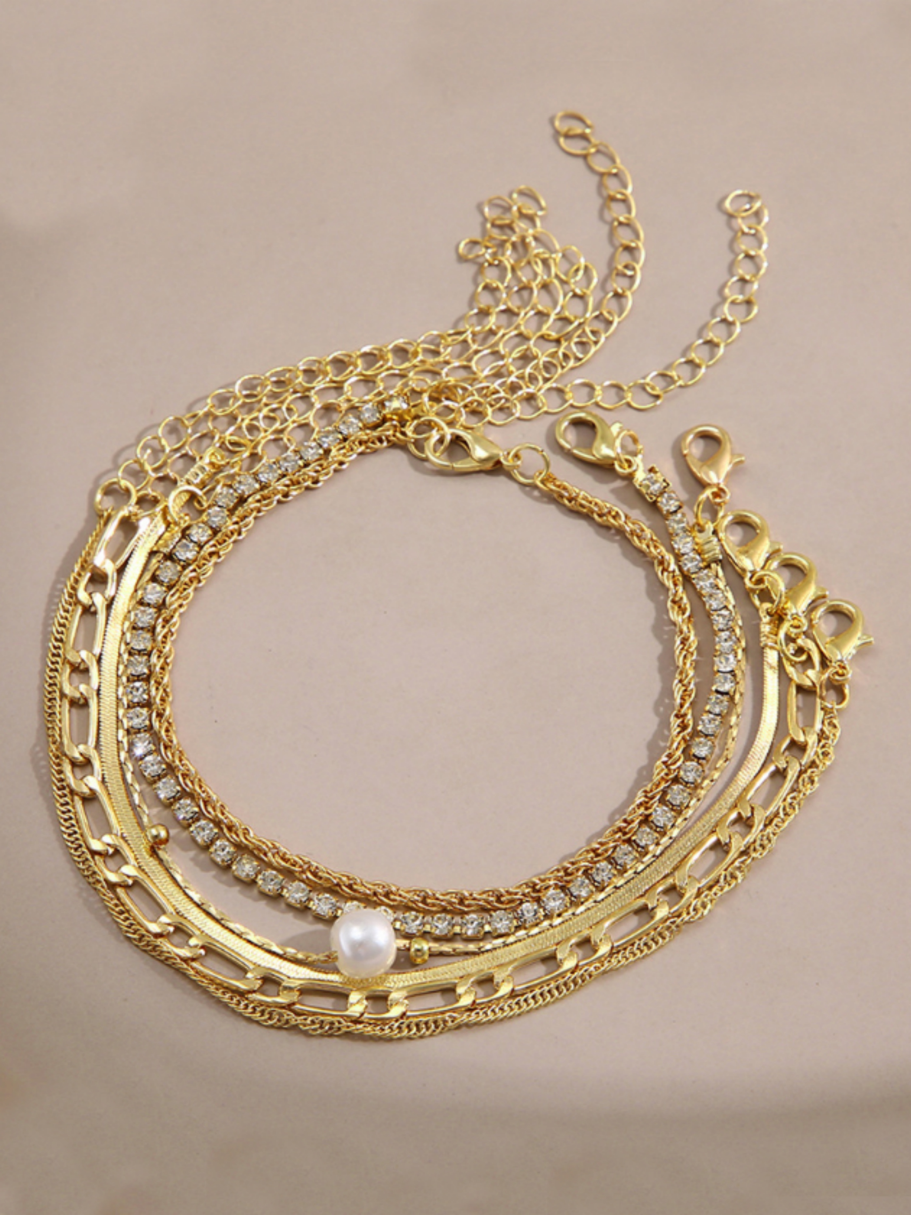6-Piece Gold Tone Charm Bracelet Stack for Casual Wear.
