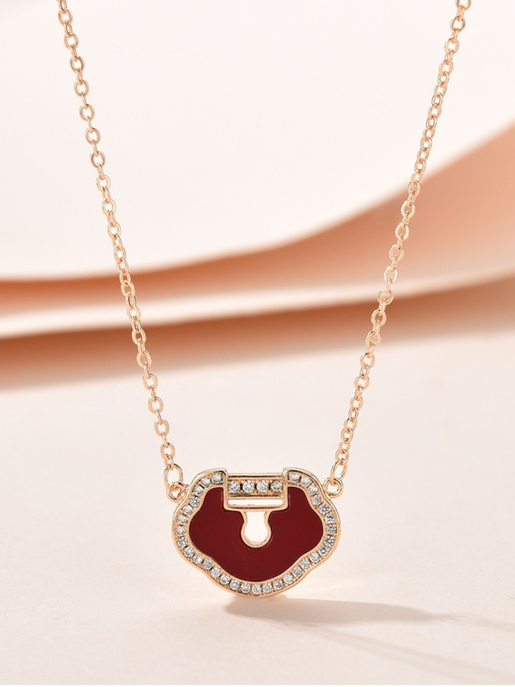 Gold Tone Red Ruyi Lock Pendant Necklace