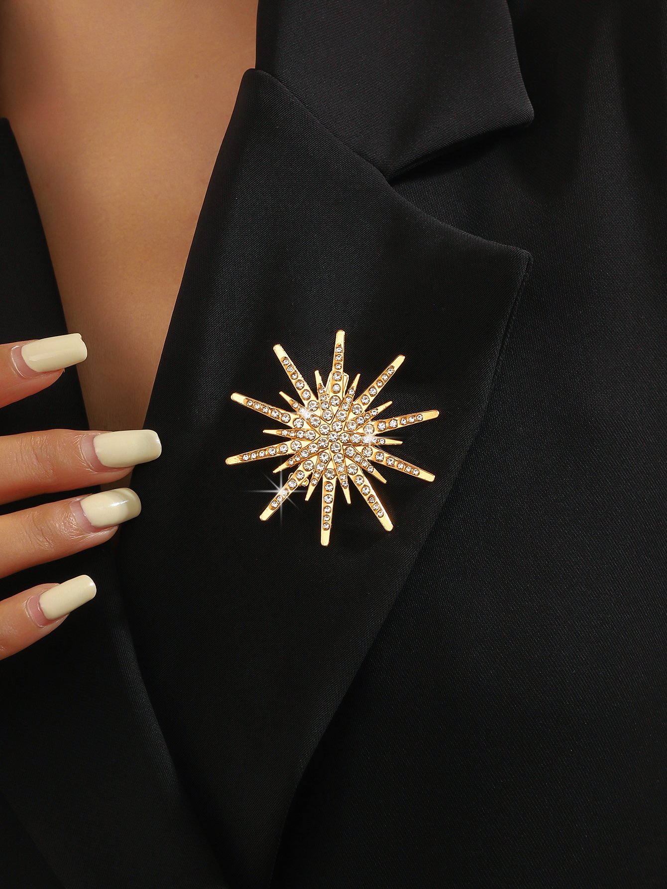 Radiant Gold Starburst Brooch