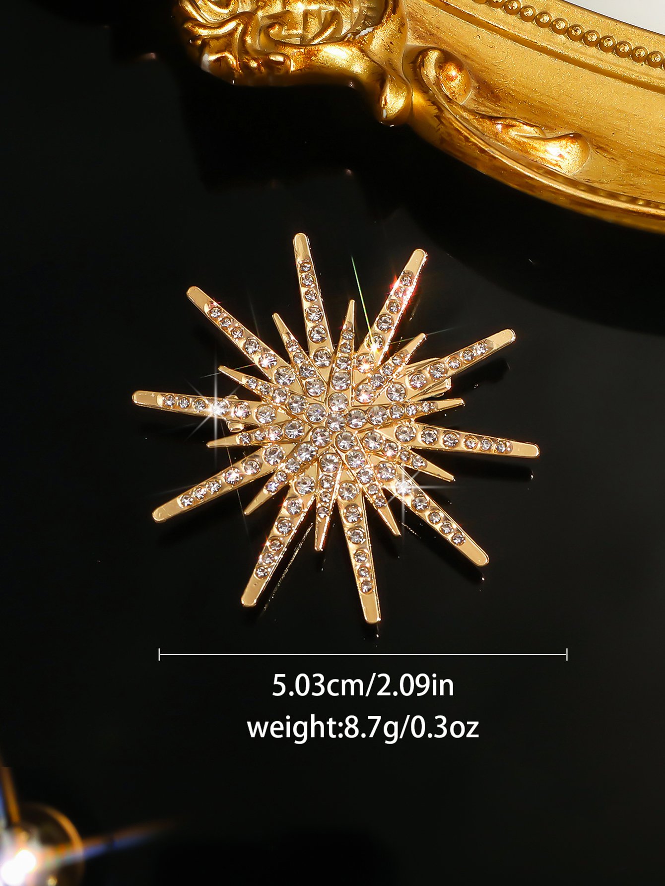 Radiant Gold Starburst Brooch