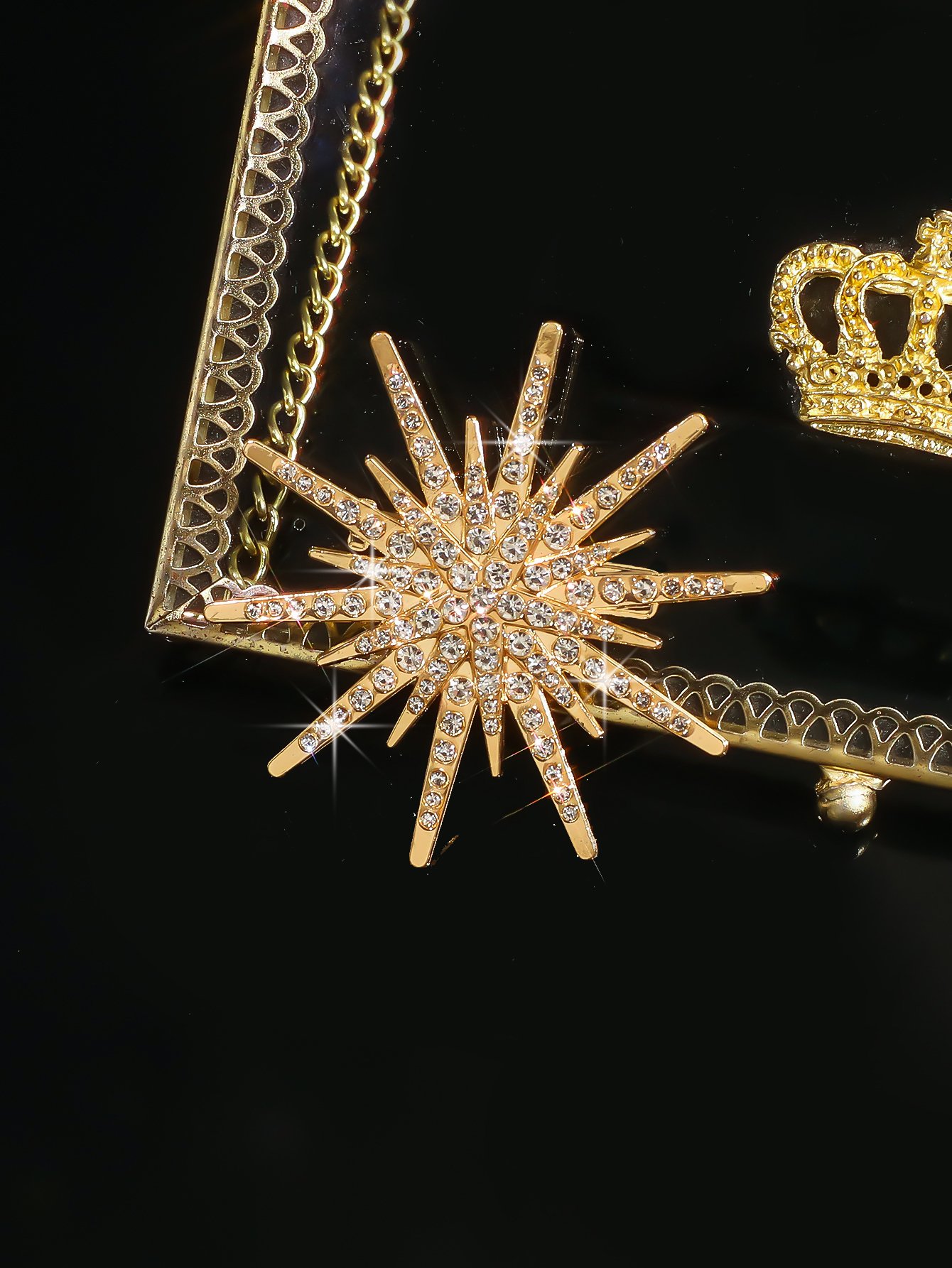 Radiant Gold Starburst Brooch